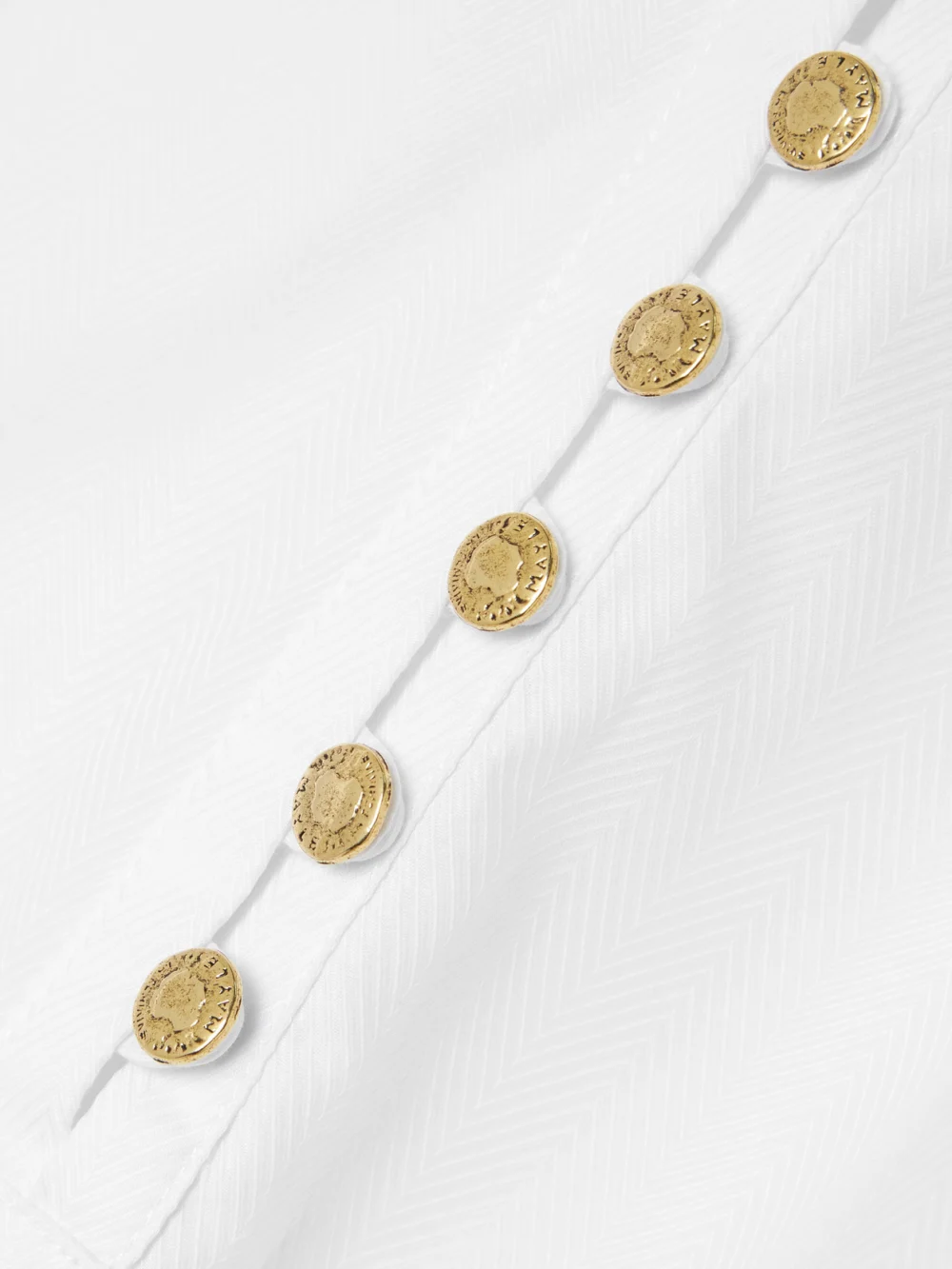 Close-up detail of the Maison Mayle Vivi Pleated Herringbone Cotton Blouse