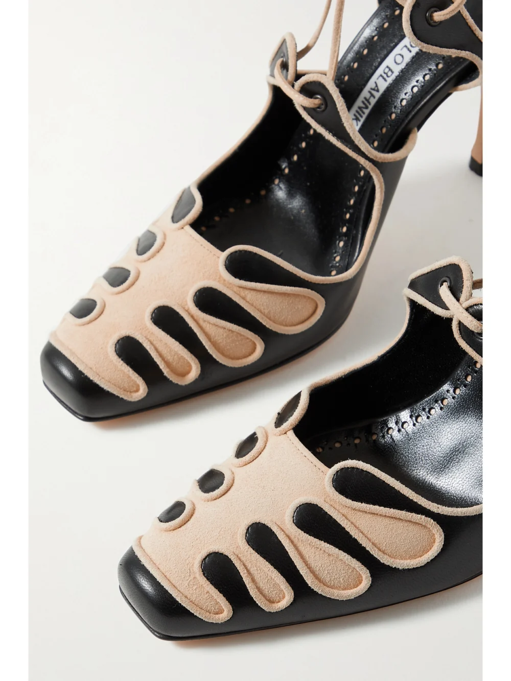 Close-up detail of the Manolo Blahnik Antero 105 Leather and Suede Pumps