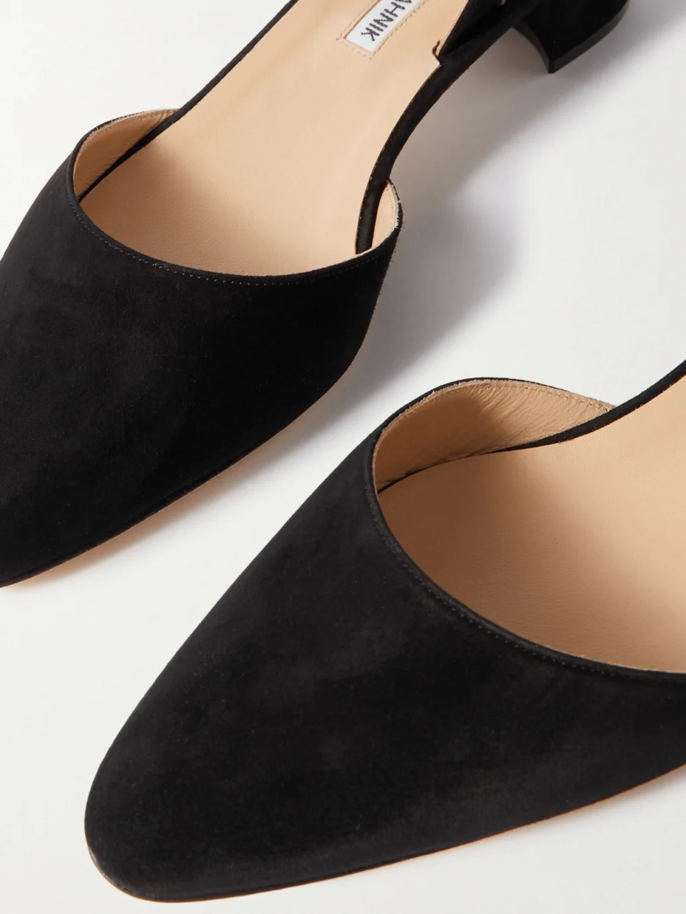 Close-up detail of the Manolo Blahnik Aspro 30 Suede Slingback Pumps