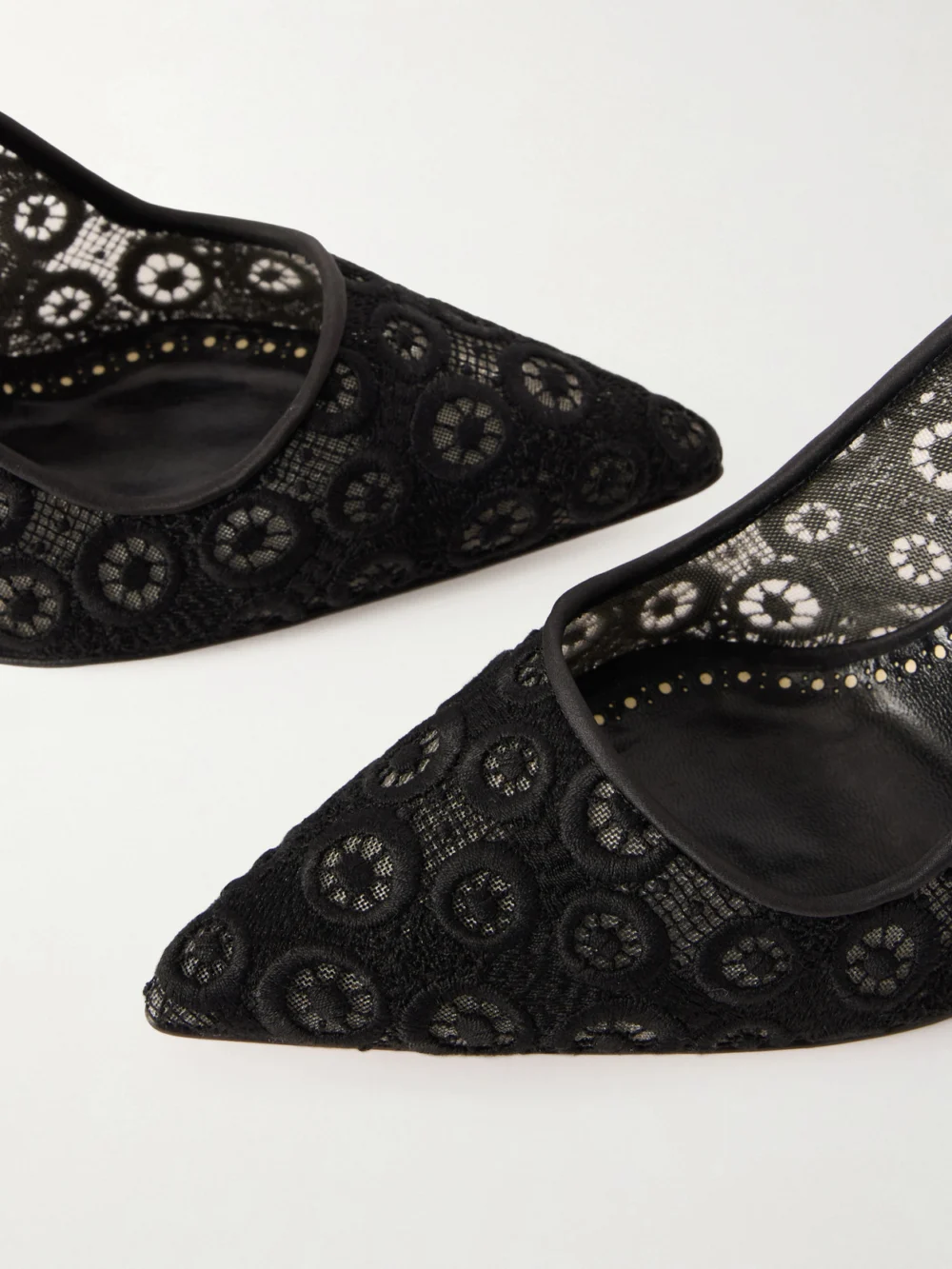 Close-up detail of the Manolo Blahnik Bb 90 Satin-trimmed Lace Pumps