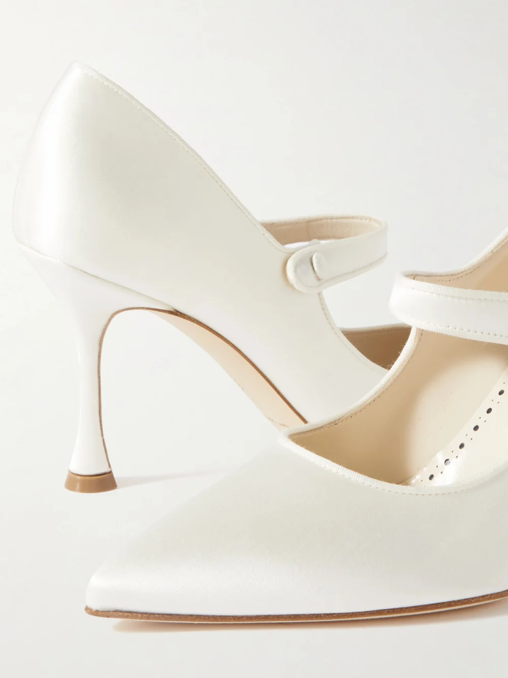 Close-up detail of the Manolo Blahnik Campari Bridal 90 Grosgrain-trimmed Satin Mary Jane Pumps