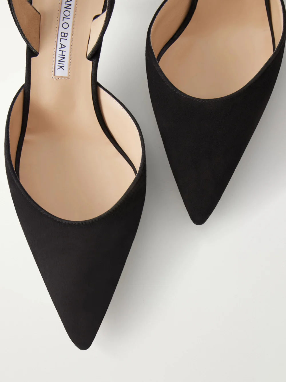 Close-up detail of the Manolo Blahnik Carolyne 50 Suede Slingback Pumps