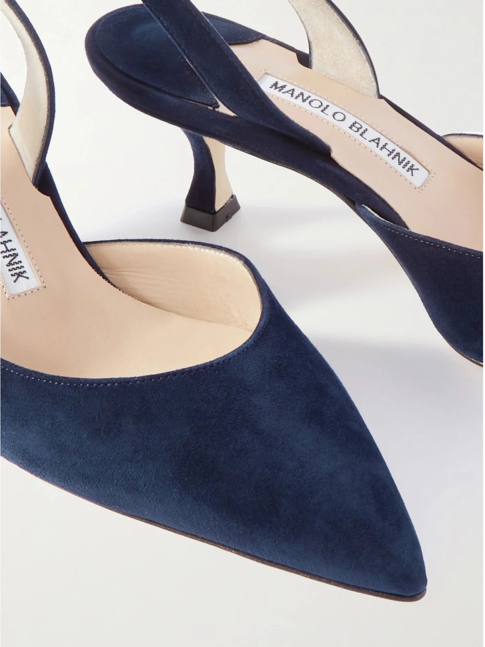 Close-up detail of the Manolo Blahnik Carolyne 50 Suede Slingback Pumps
