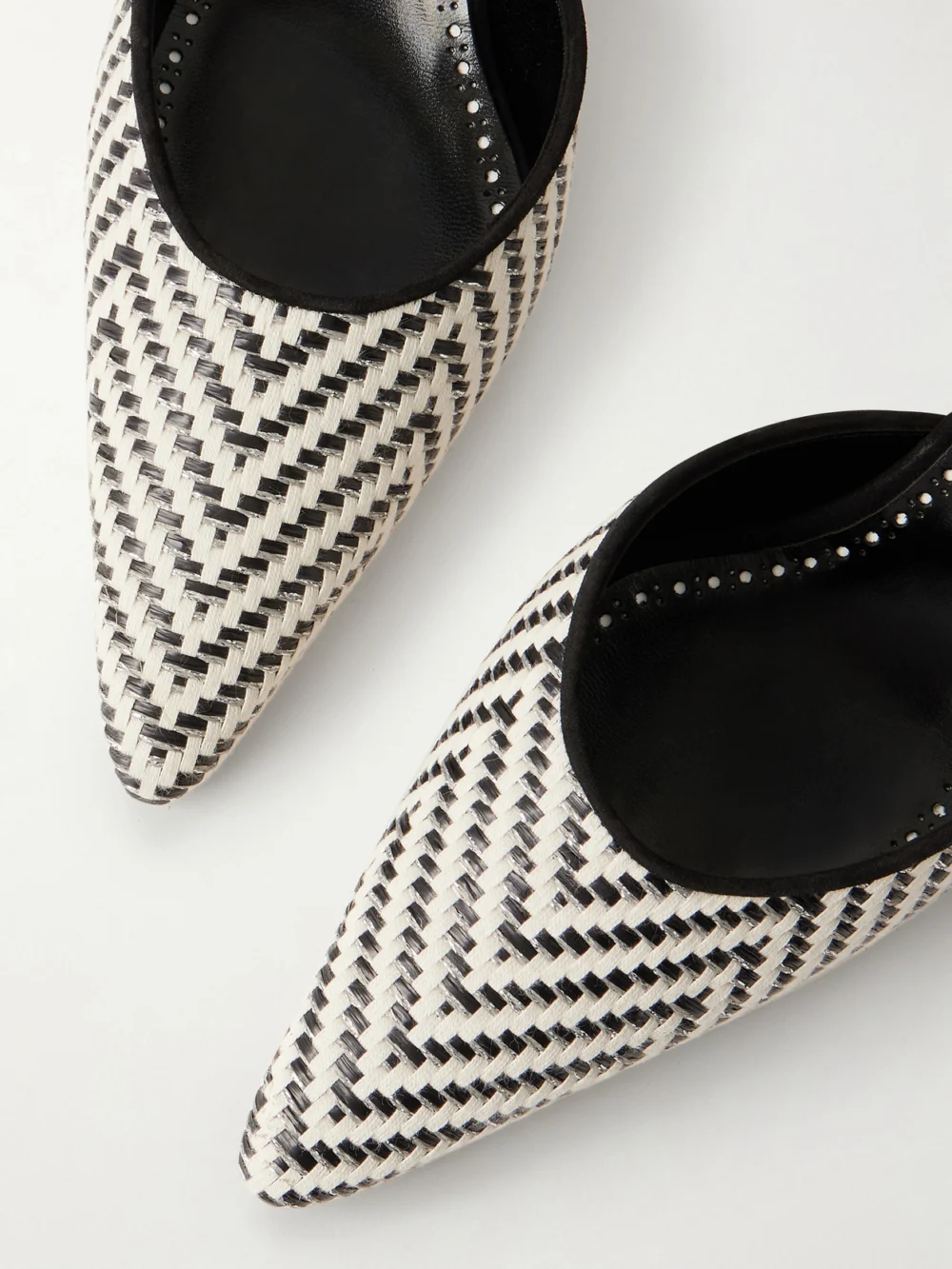 Close-up detail of the Manolo Blahnik Carolyne 50 Suede-trimmed Metallic Woven Raffia Mules