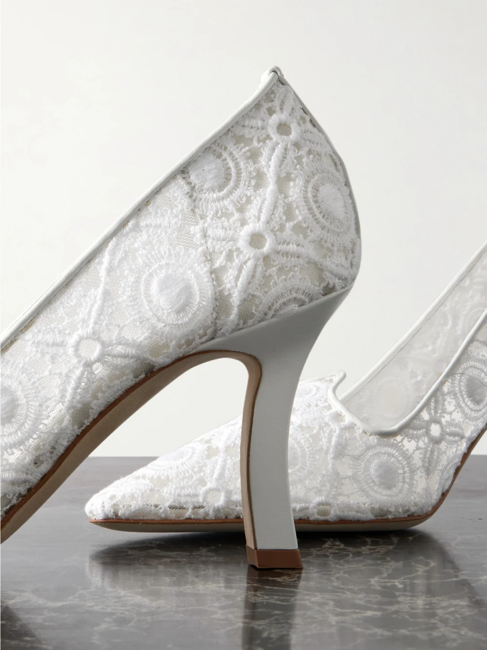 Close-up detail of the Manolo Blahnik Euridi 90 Leather-trimmed Lace Pumps