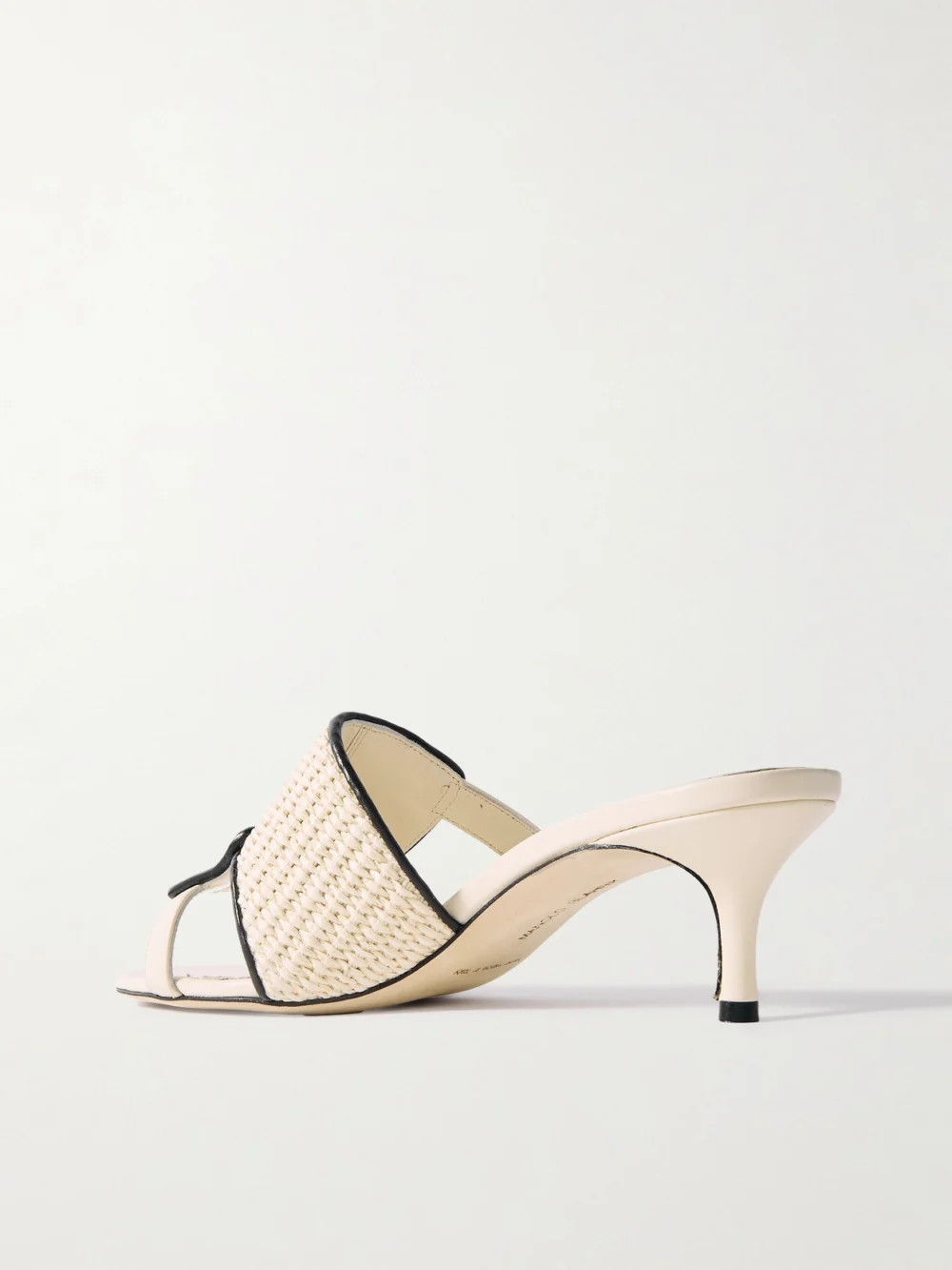 Back view of the Manolo Blahnik Fabiolamu 50 Cutout Leather-trimmed Two-tone Raffia Mules