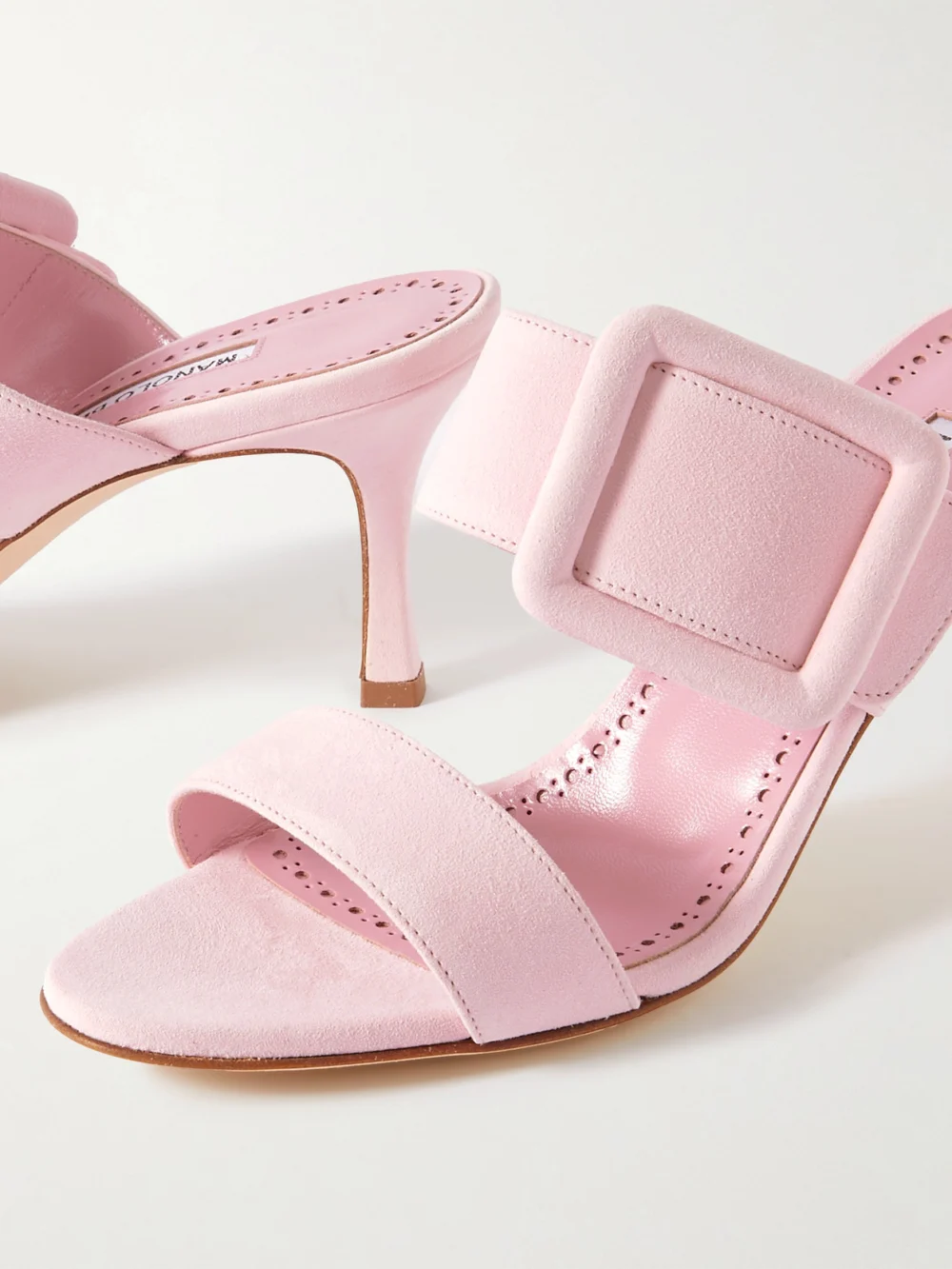 Close-up detail of the Manolo Blahnik Gable 70 Buckled Suede Mules