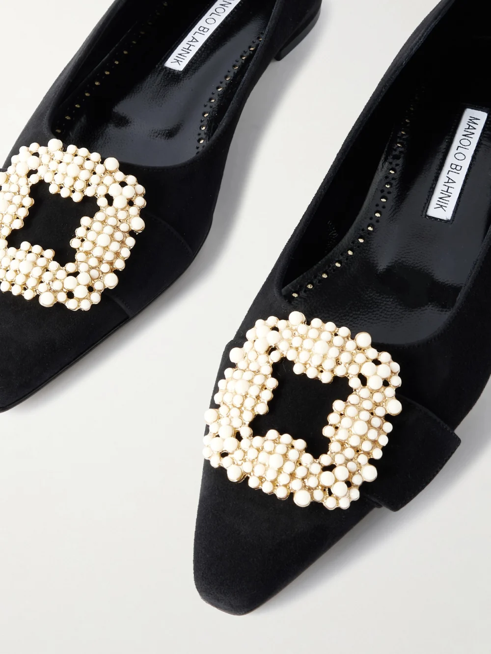 Close-up detail of the Manolo Blahnik Gibfla Embellished Suede Ballet Flats