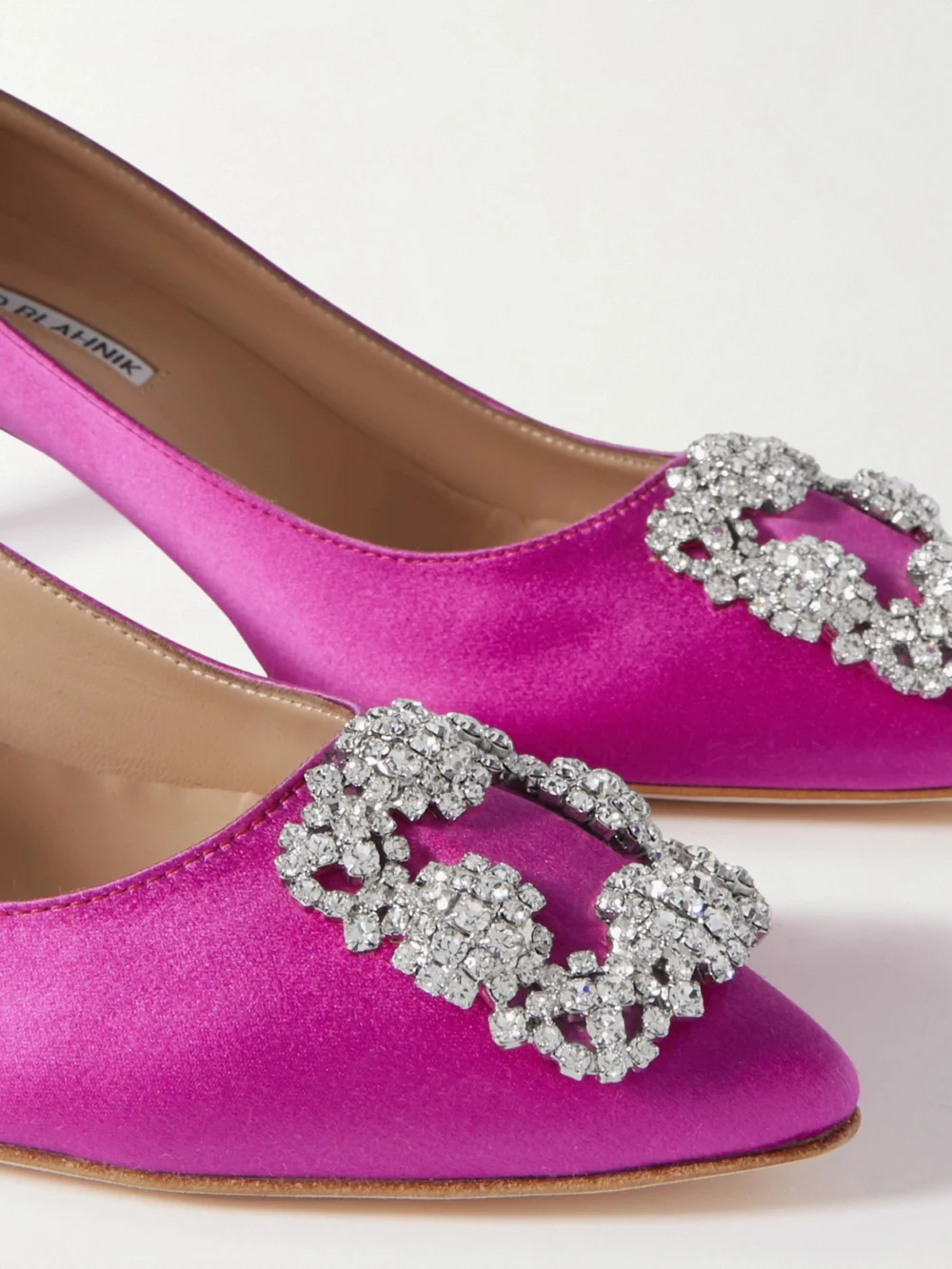 Close-up detail of the Manolo Blahnik Hangisi 50 Crystal-embellished Satin Pumps