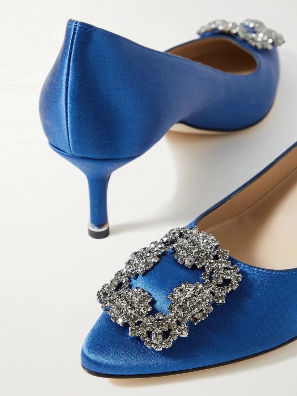 Close-up detail of the Manolo Blahnik Hangisi 50 Crystal-embellished Satin Pumps