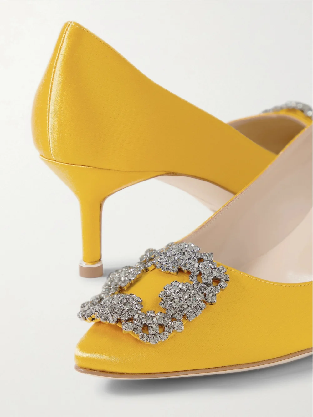 Close-up detail of the Manolo Blahnik Hangisi 50 Crystal-embellished Satin Pumps