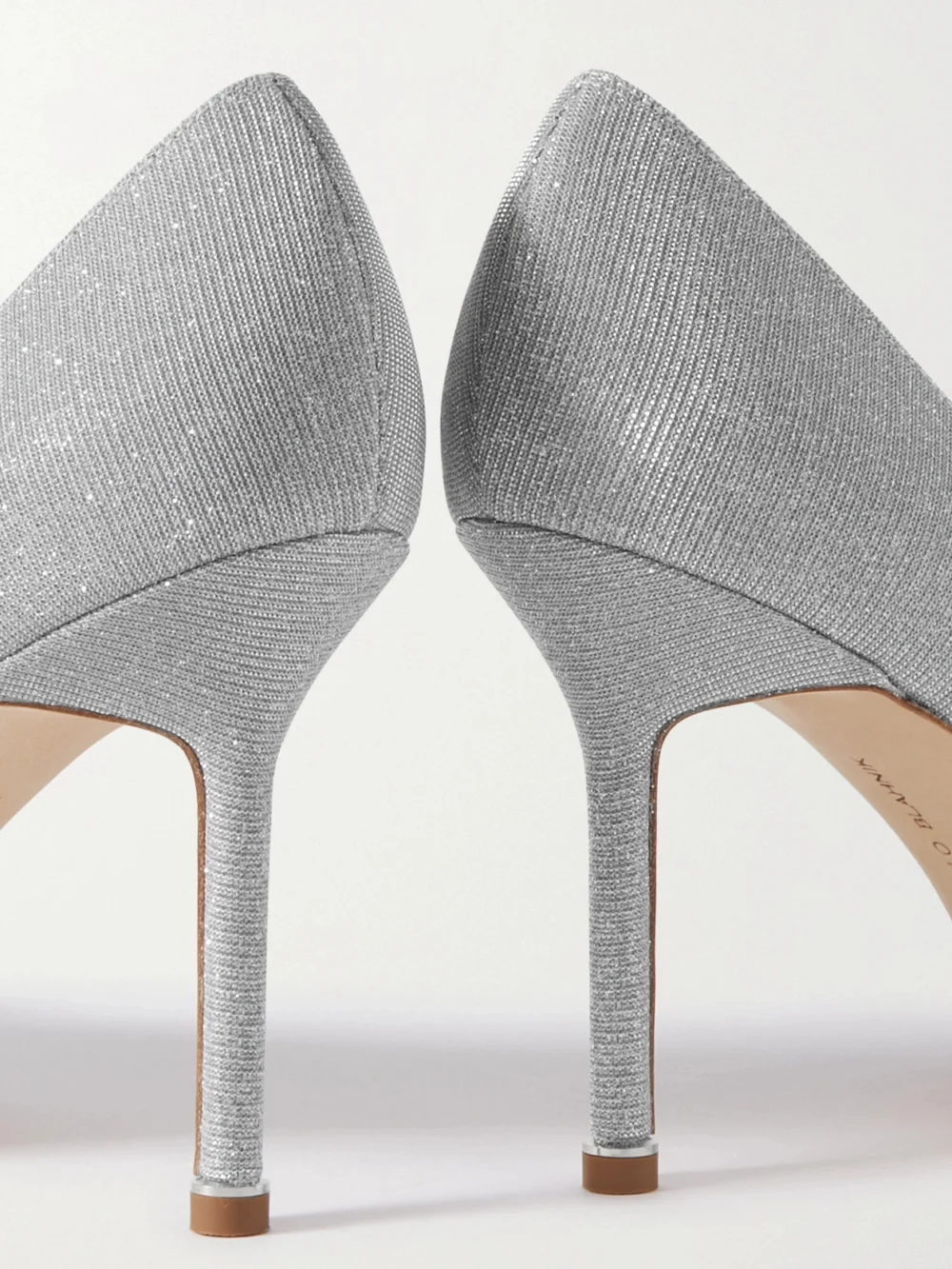 Close-up detail of the Manolo Blahnik Hangisi 90 Crystal-embellished Glittered Satin Pumps