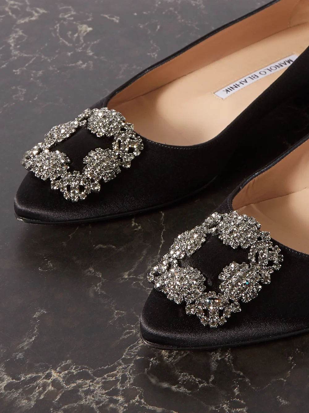 Close-up detail of the Manolo Blahnik Hangisi Crystal-embellished Satin Point-toe Flats