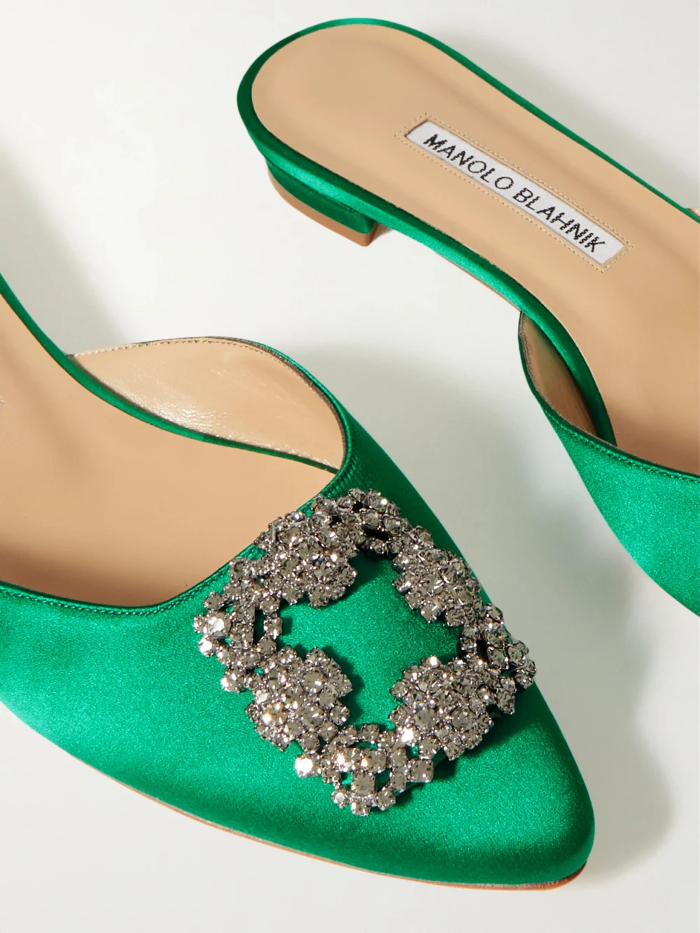 Close-up detail of the Manolo Blahnik Hangisi Crystal-embellished Satin Slippers