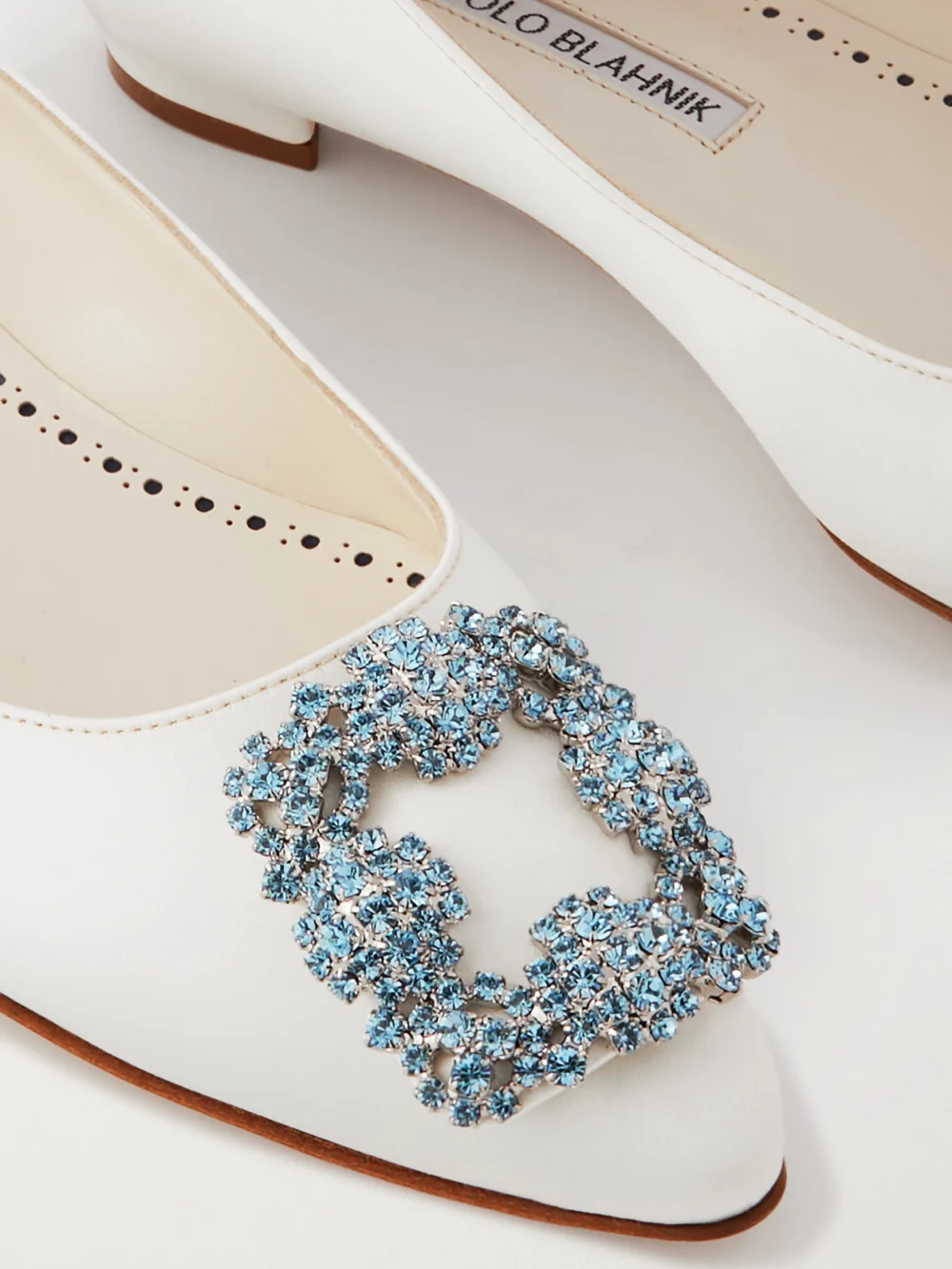 Close-up detail of the Manolo Blahnik Hangisiflat Crystal-embellished Satin Point-toe Flats