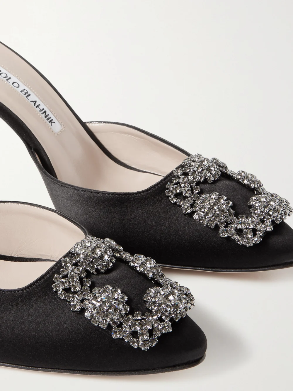 Close-up detail of the Manolo Blahnik Hangisimu 70 Embellished Satin Mules