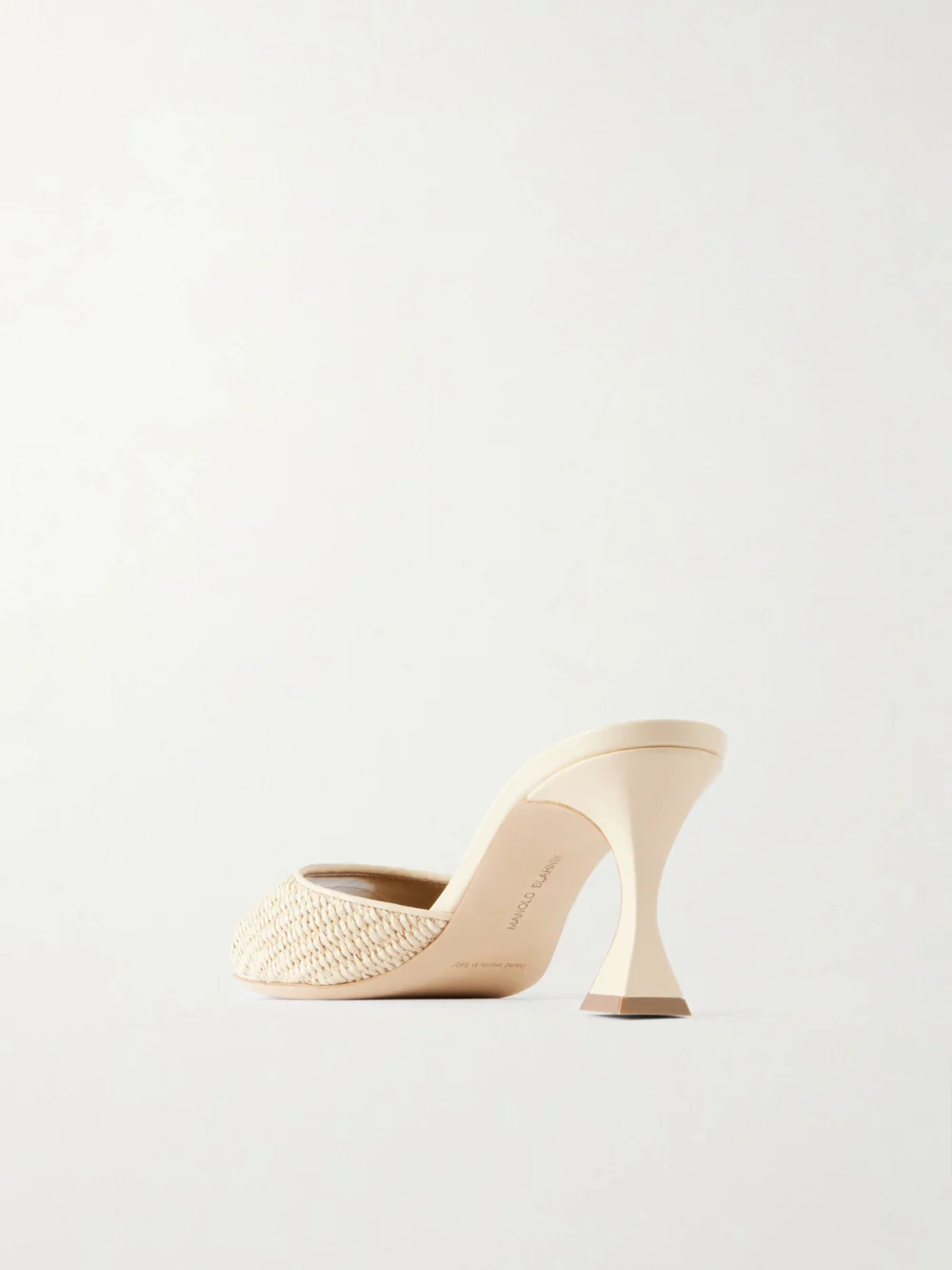 Back view of the Manolo Blahnik Jadara 70 Leather-trimmed Raffia Mules