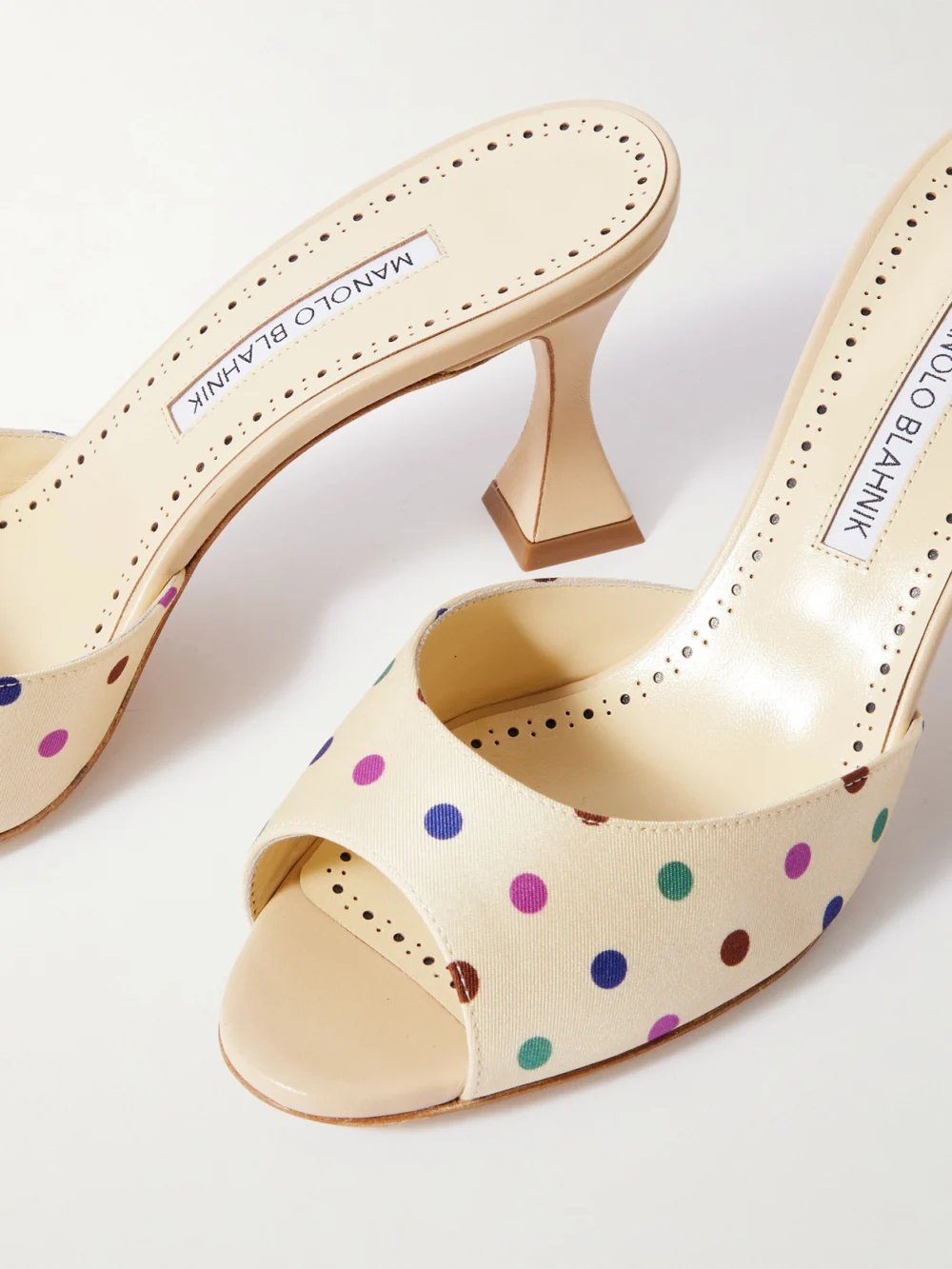 Close-up detail of the Manolo Blahnik Jadaron 70 Polka-dot Silk-satin Mules