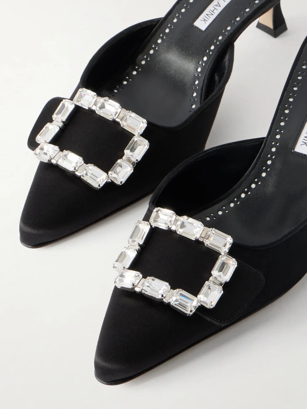 Close-up detail of the Manolo Blahnik Mayjou 50 Crystal-embellished Satin Mules
