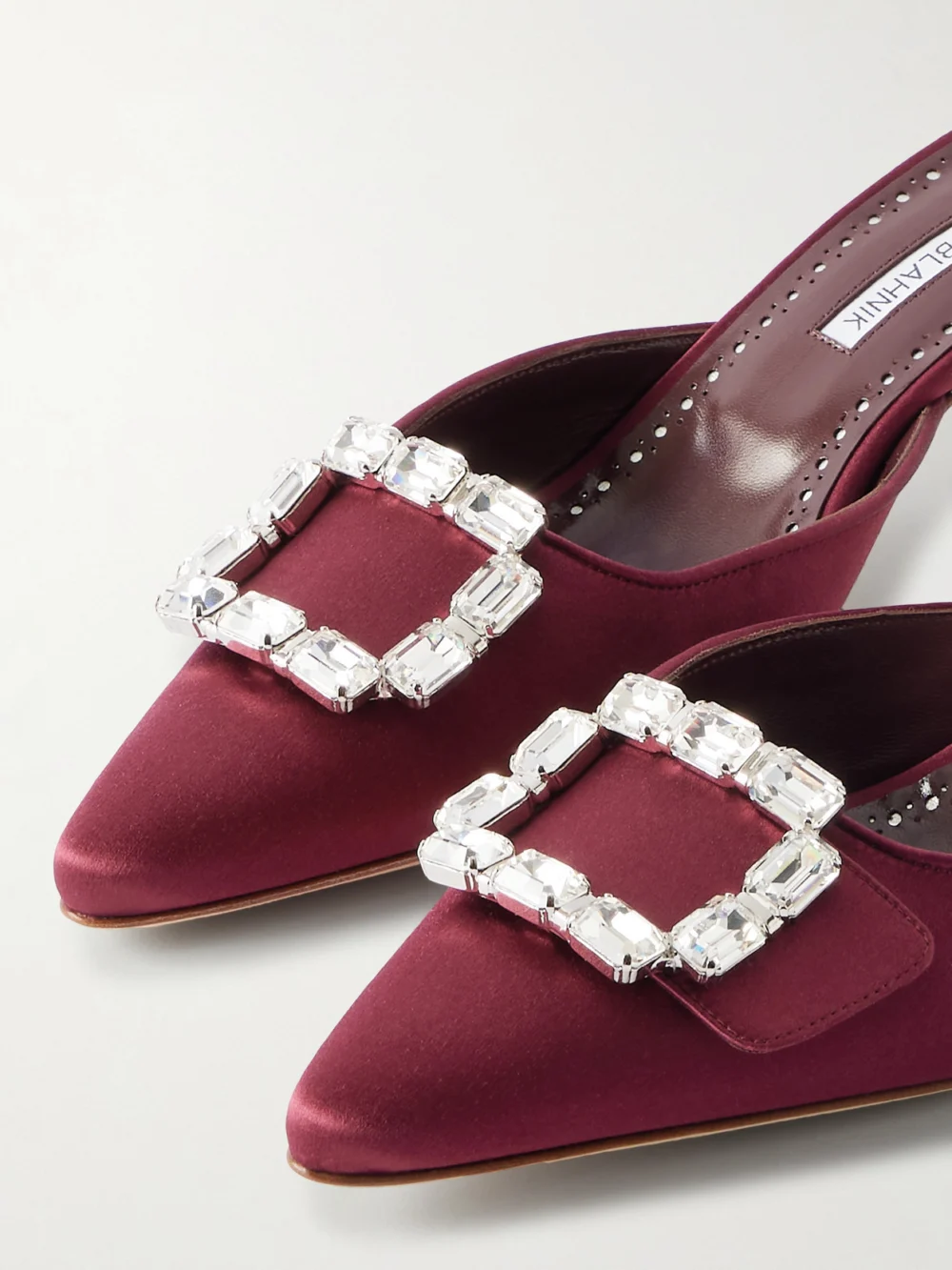 Close-up detail of the Manolo Blahnik Mayjou 50 Crystal-embellished Satin Mules