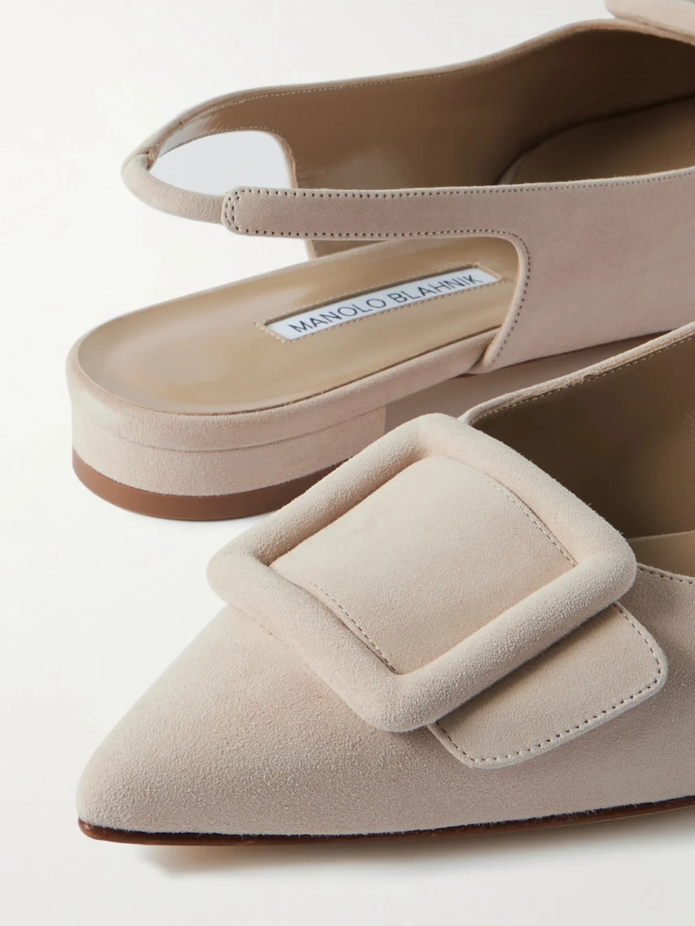 Close-up detail of the Manolo Blahnik Maylura Buckled Suede Slingback Flats