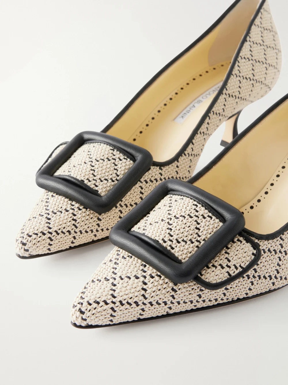 Close-up detail of the Manolo Blahnik Maysale 50 Buckled Leather-trimmed Raffia Pumps