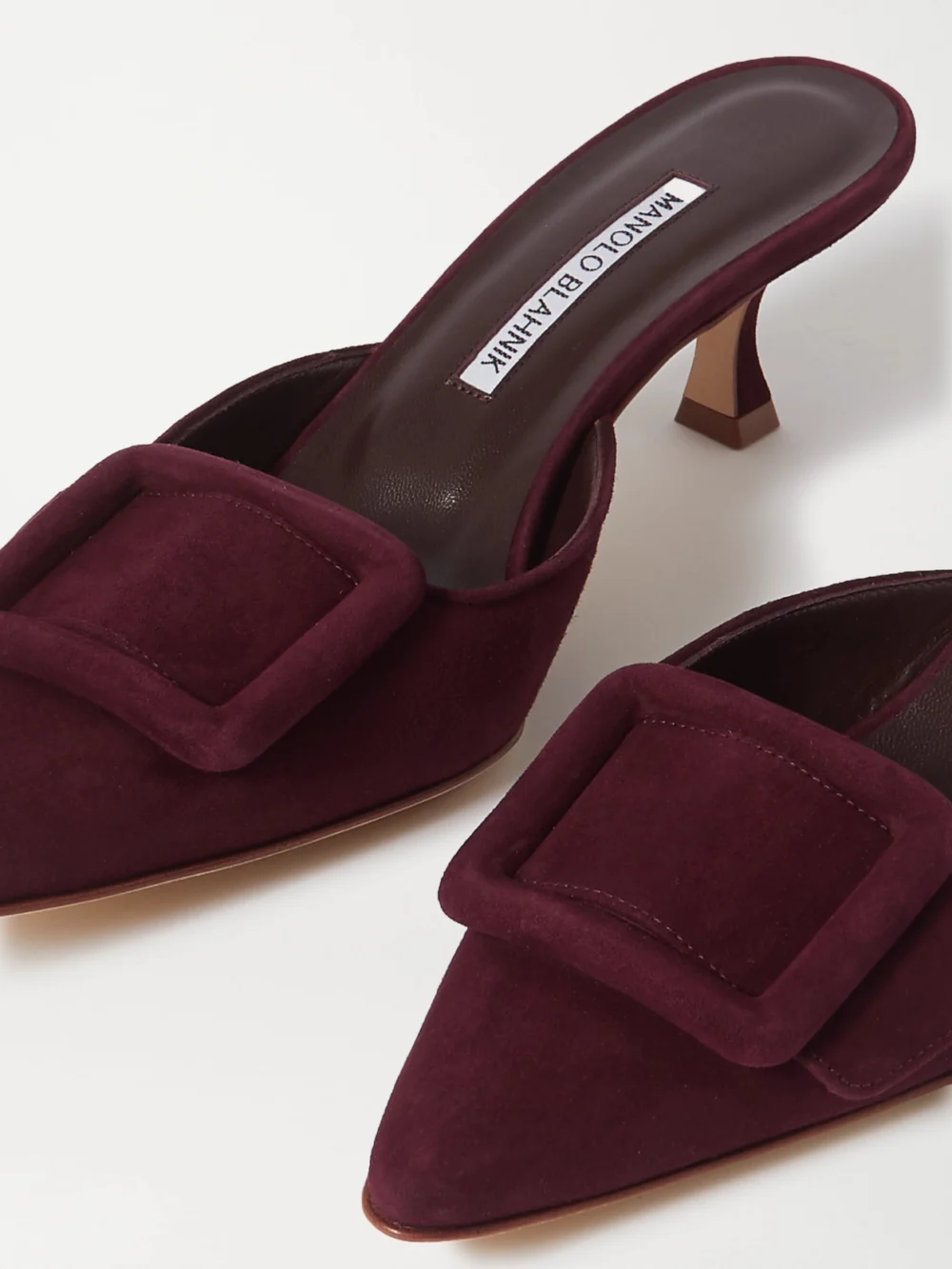 Close-up detail of the Manolo Blahnik Maysale 50 Buckled Suede Mules