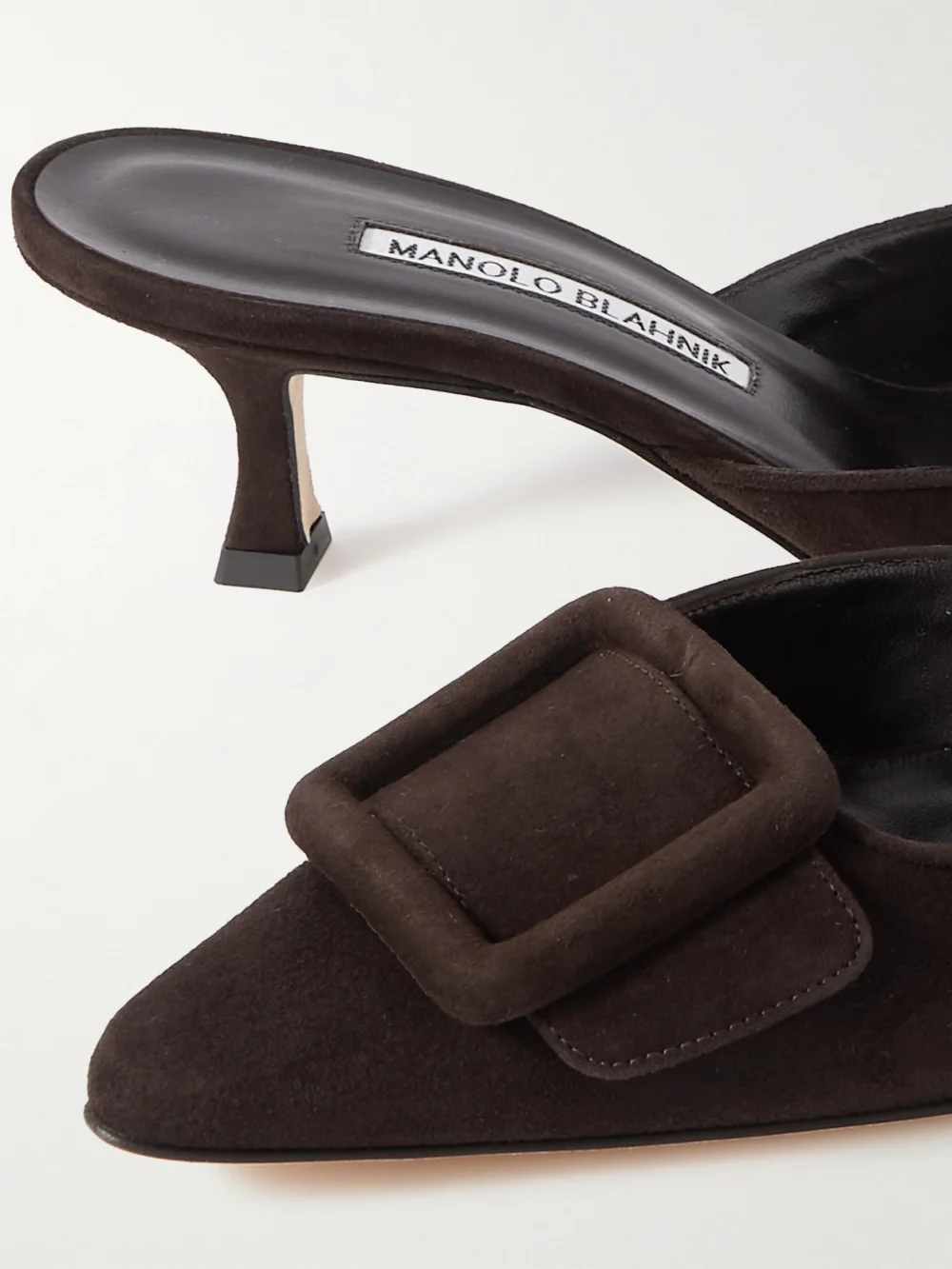 Close-up detail of the Manolo Blahnik Maysale 50 Buckled Suede Mules