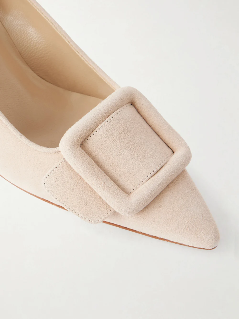 Close-up detail of the Manolo Blahnik Maysale 50 Buckled Suede Pumps