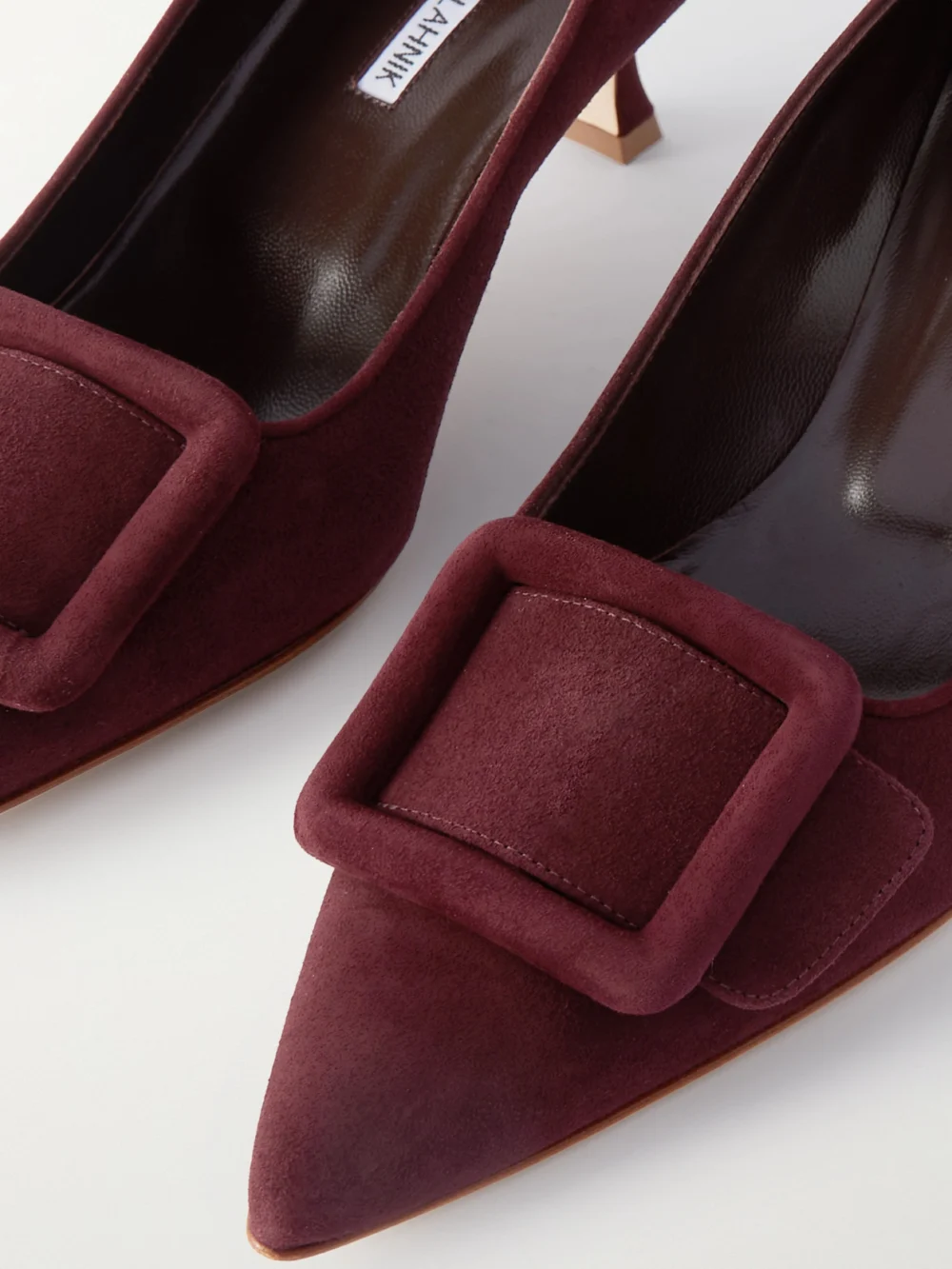 Close-up detail of the Manolo Blahnik Maysale 50 Buckled Suede Pumps
