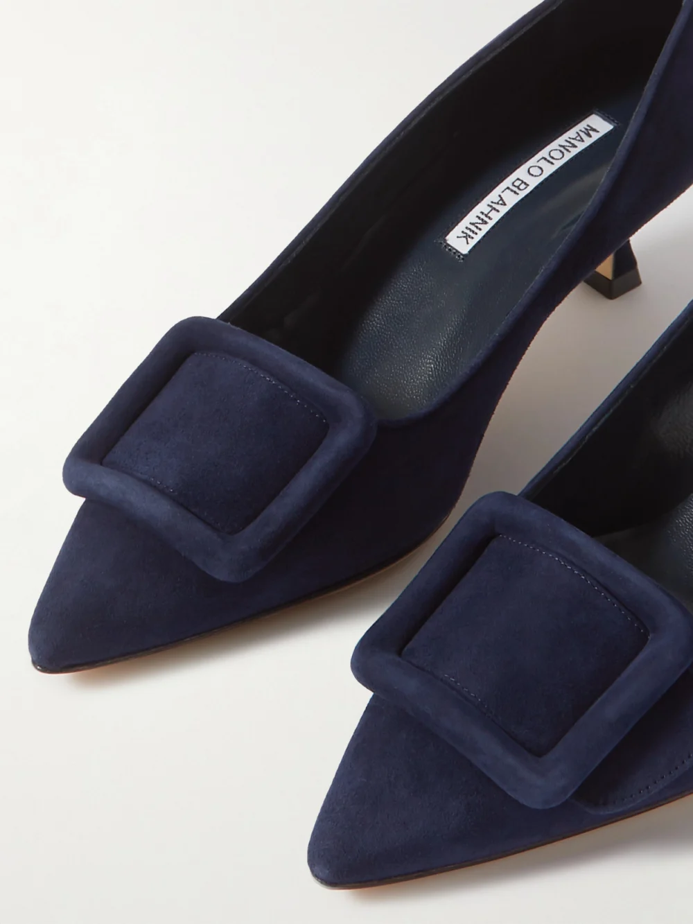 Close-up detail of the Manolo Blahnik Maysale 50 Buckled Suede Pumps