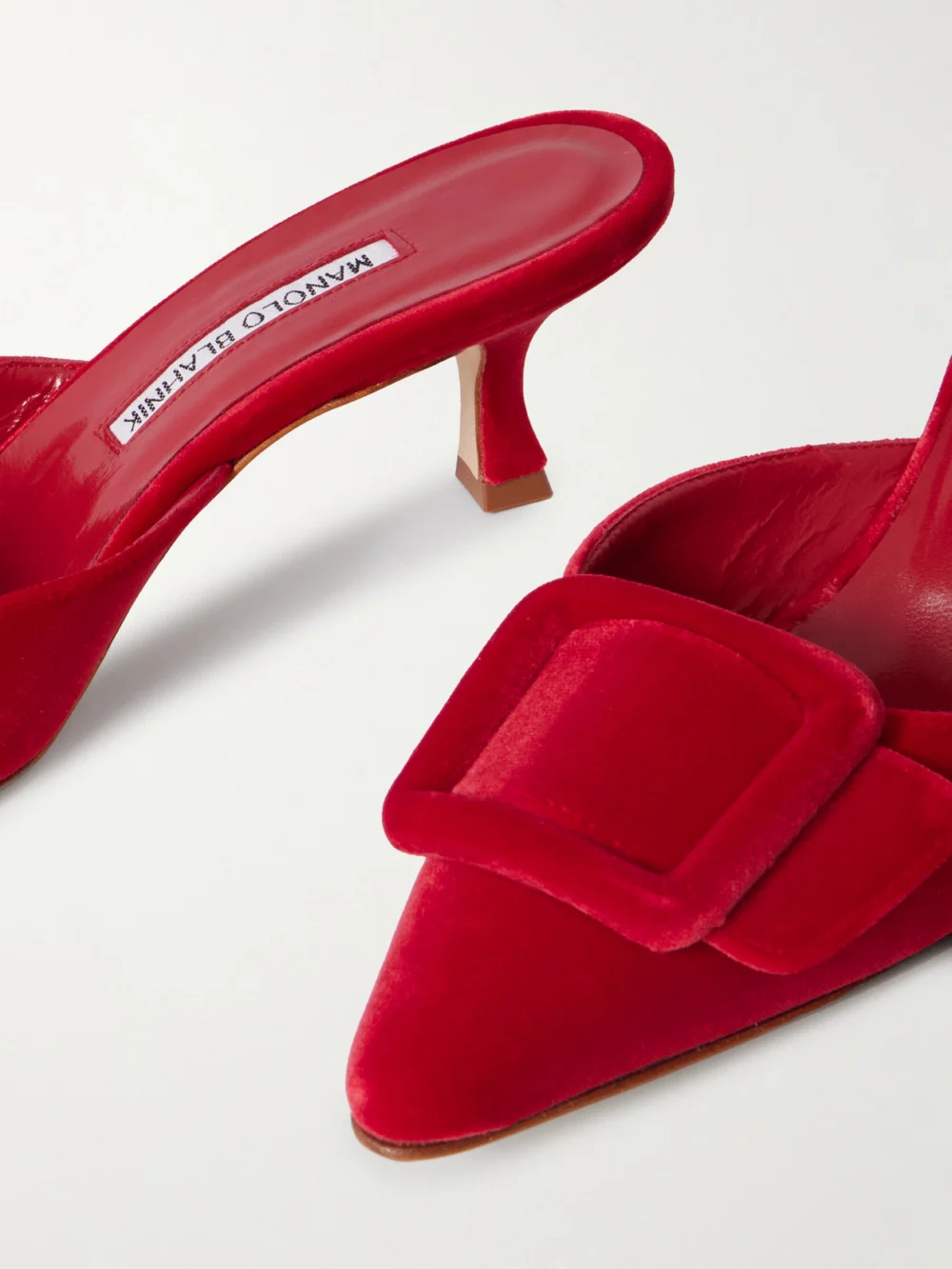 Close-up detail of the Manolo Blahnik Maysale 50 Buckled Velvet Mules