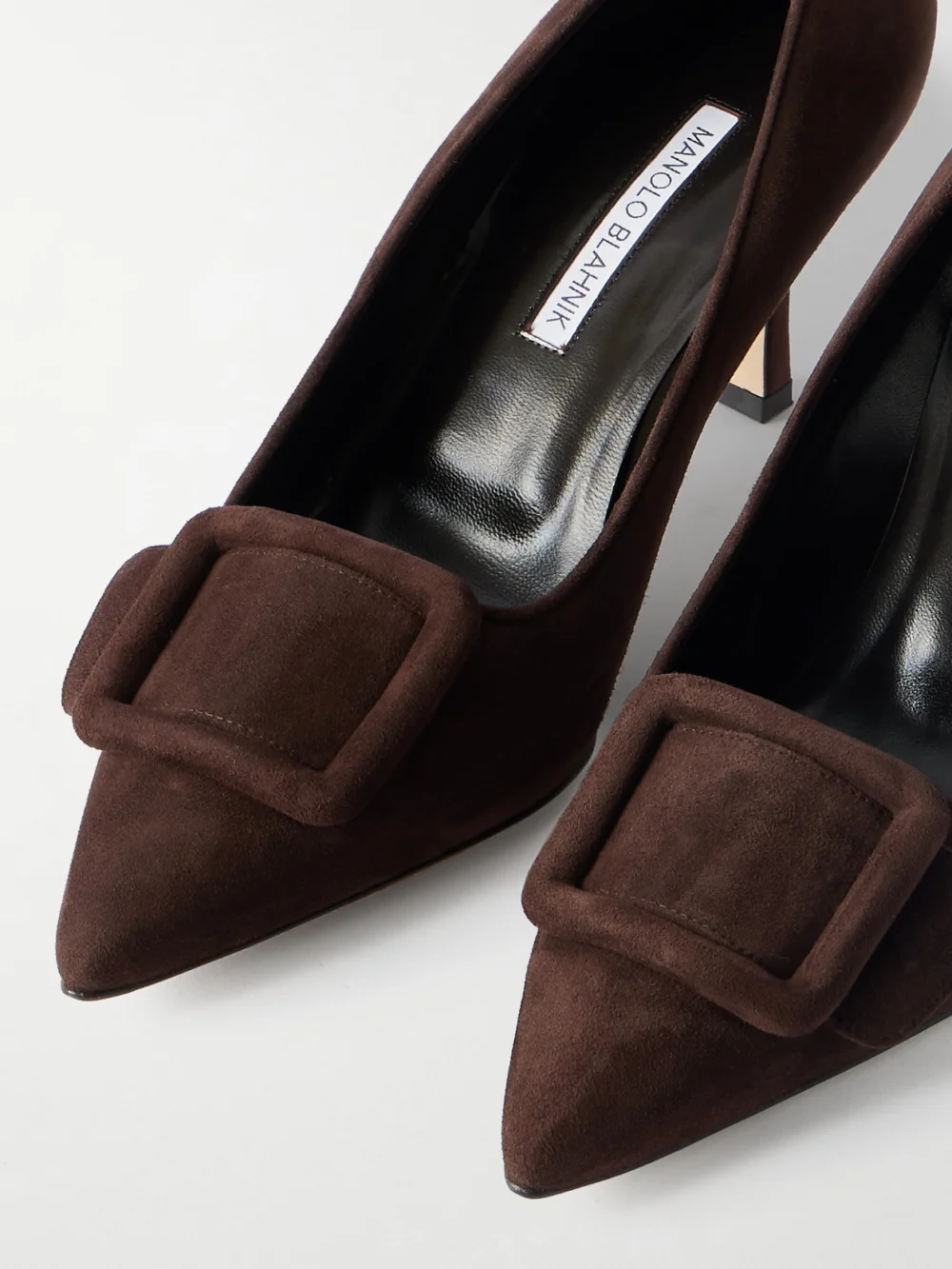 Close-up detail of the Manolo Blahnik Maysale 70 Buckled Suede Pumps