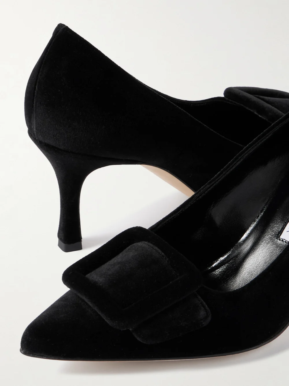 Close-up detail of the Manolo Blahnik Maysale 70 Buckled Velvet Pumps