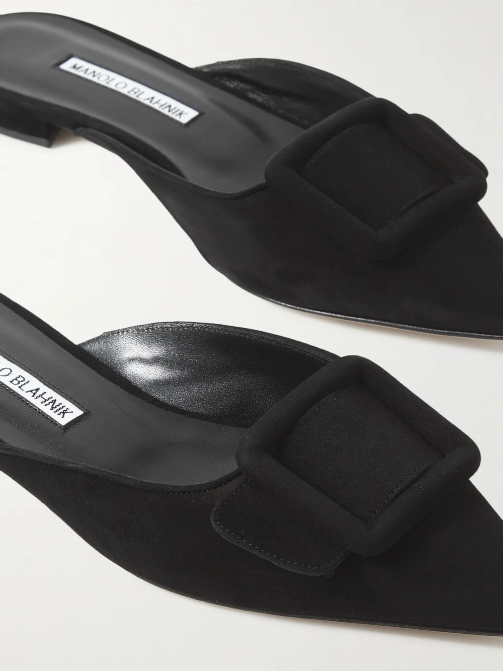 Close-up detail of the Manolo Blahnik Maysale Buckled Suede Point-toe Flats