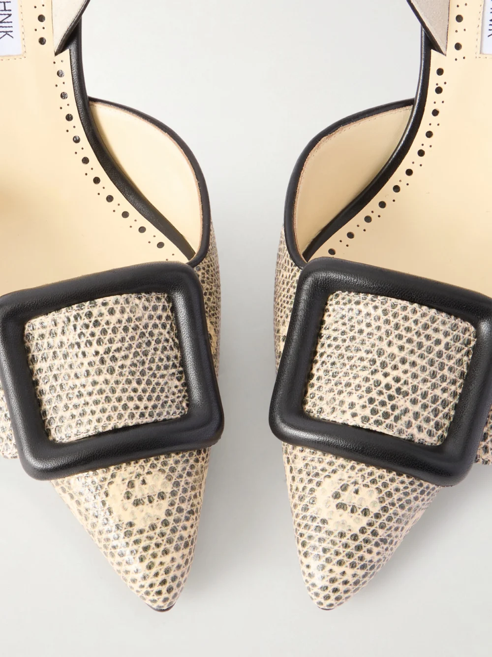 Close-up detail of the Manolo Blahnik Mayslibi 70 Lizard-effect Leather Slingback Pumps