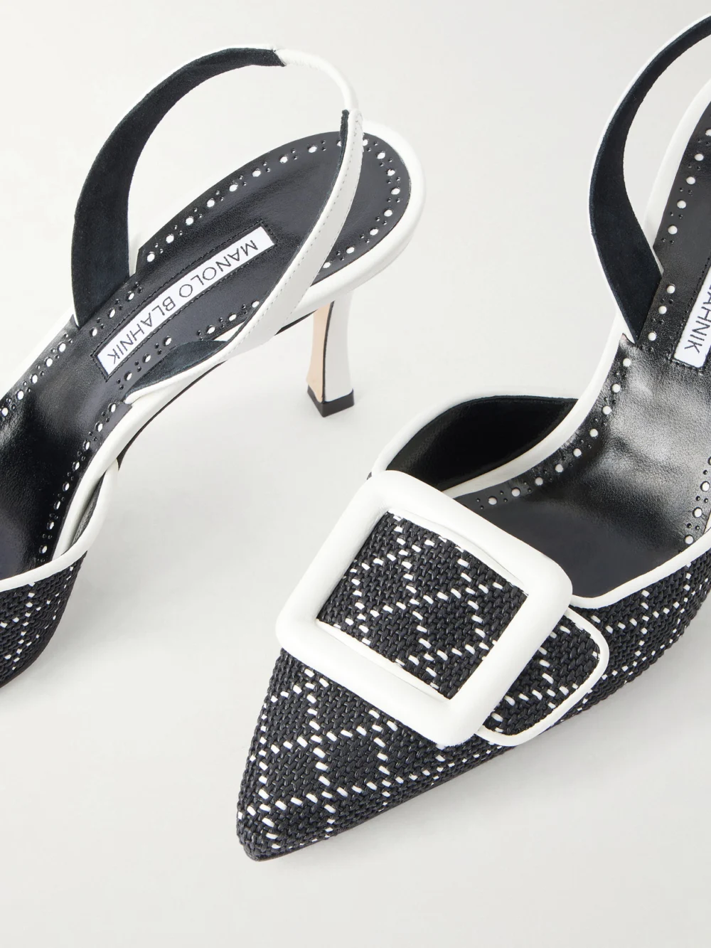 Close-up detail of the Manolo Blahnik Mayslibi 70 Woven Leather Slingback Pumps