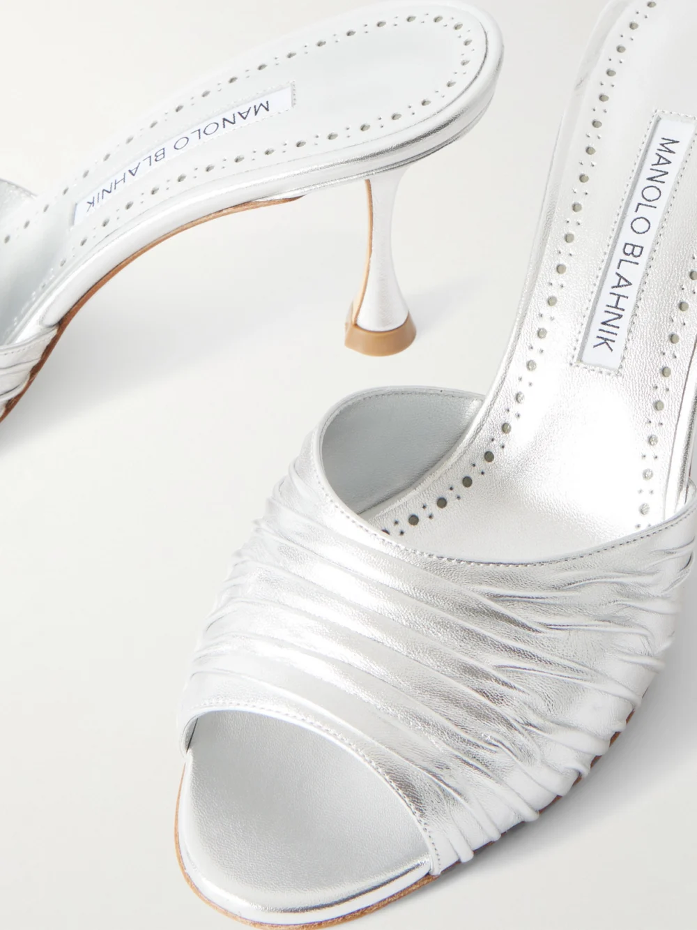 Close-up detail of the Manolo Blahnik Pirua 70 Crinkled Metallic Leather Mules