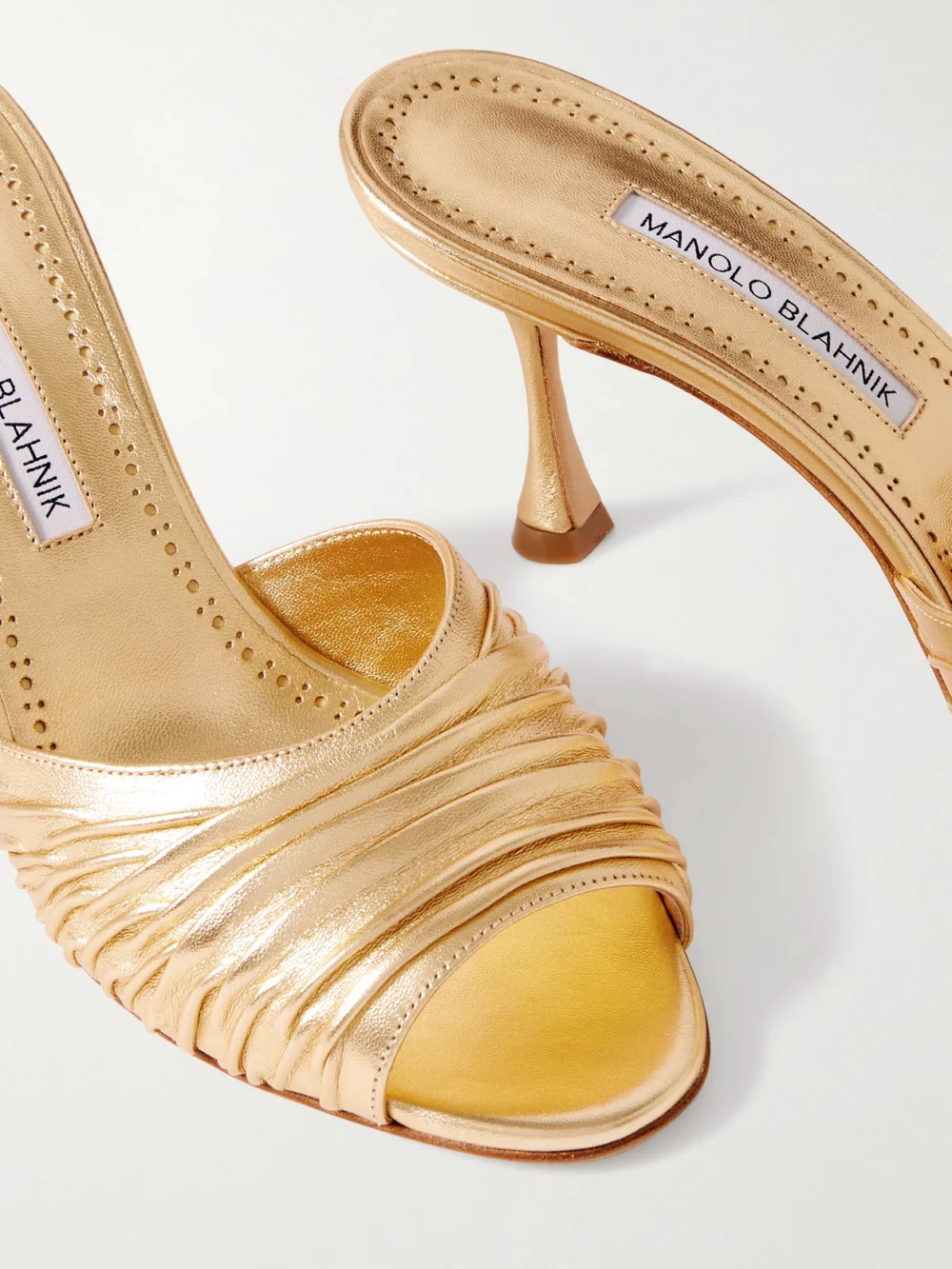 Close-up detail of the Manolo Blahnik Pirua 70 Metallic Leather Mules