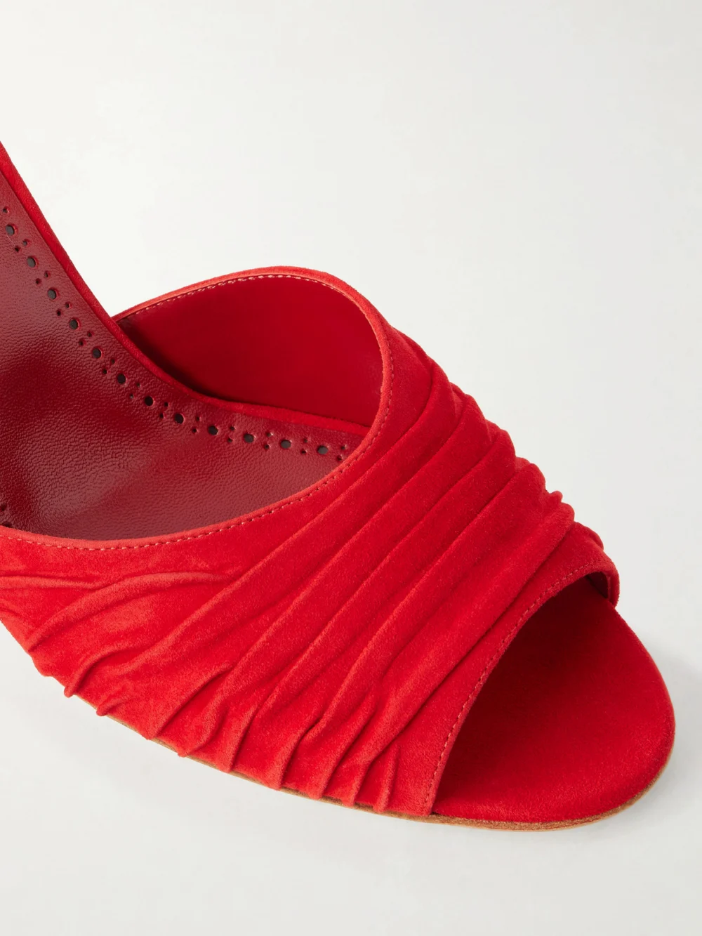 Close-up detail of the Manolo Blahnik Pirua 70 Ruched Suede Mules