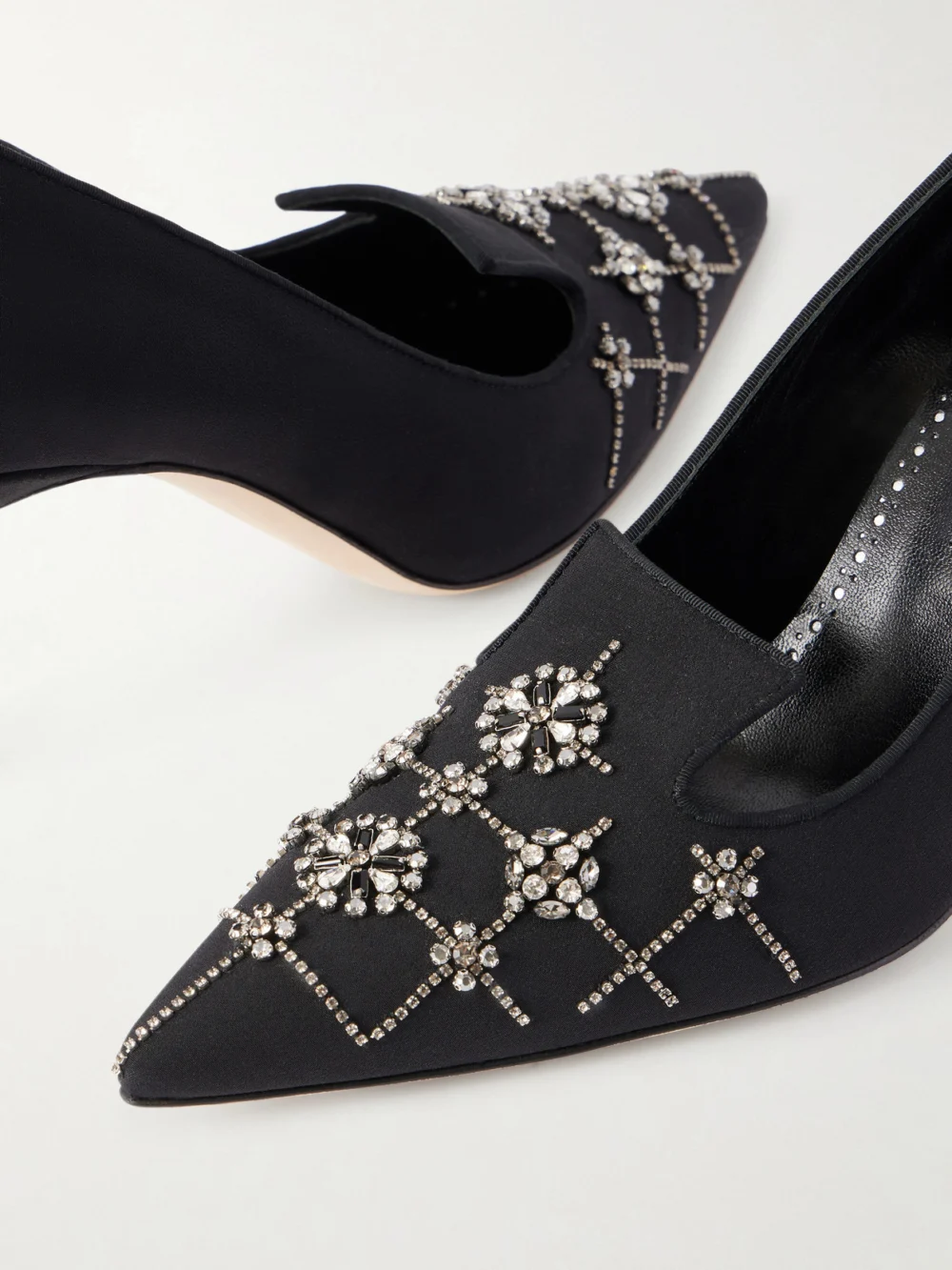 Close-up detail of the Manolo Blahnik Ralypla 70 Embellished Crepe De Chine Pumps
