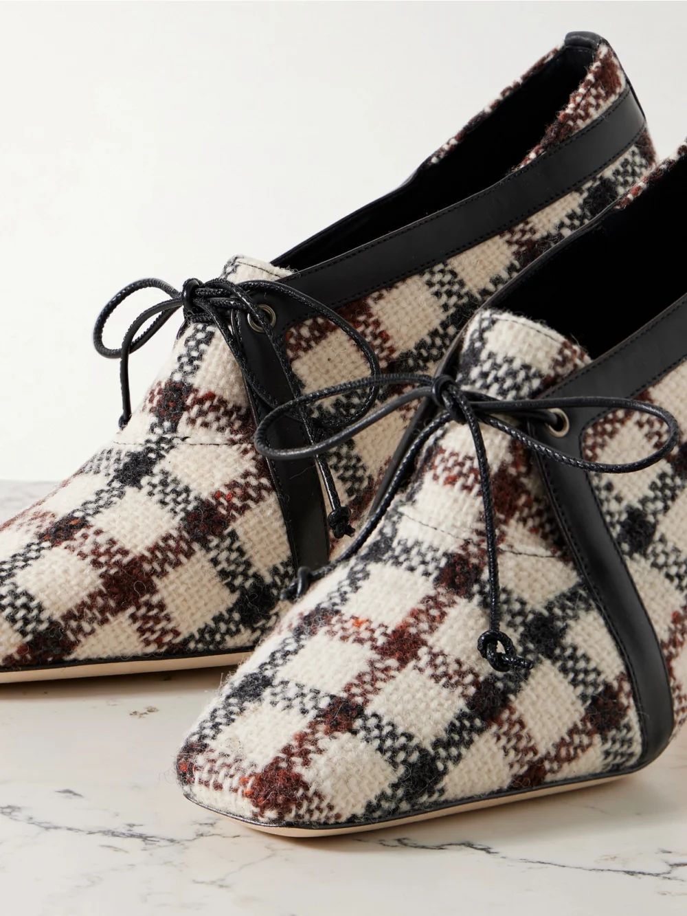 Close-up detail of the Manolo Blahnik Stagira 90 Leather-trimmed Checked Tweed Pumps
