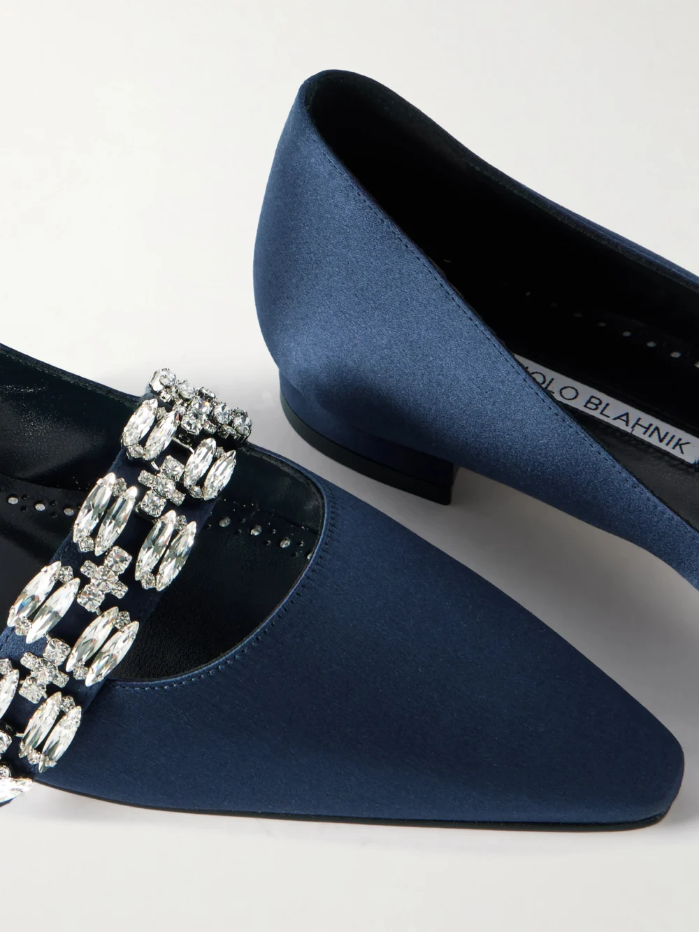 Close-up detail of the Manolo Blahnik Tamolflat 10 Crystal-embellished Satin Point-toe Flats