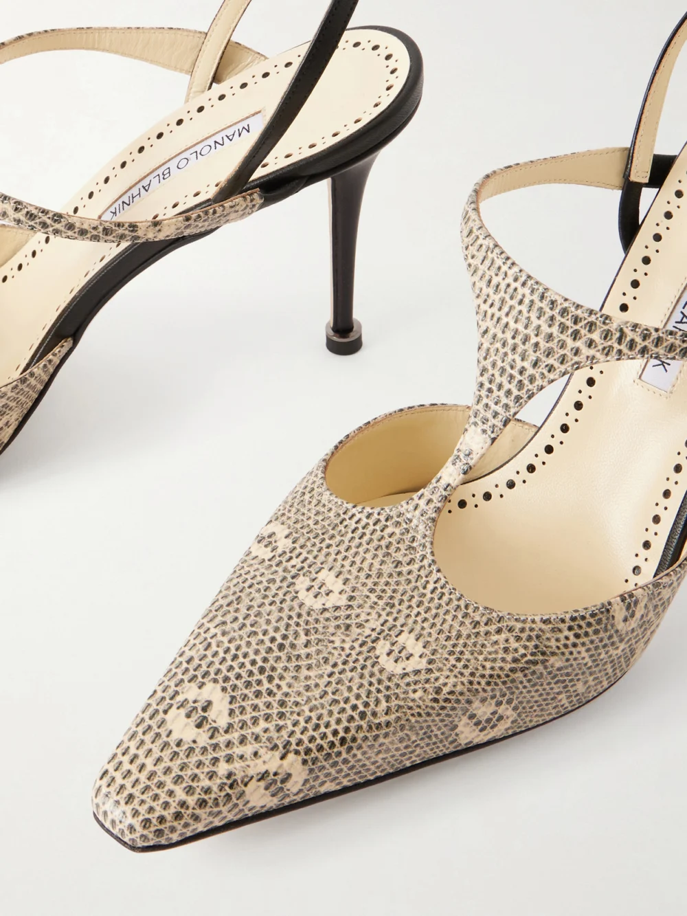 Close-up detail of the Manolo Blahnik Titon 90 Lizard-effect Leather Slingback Pumps