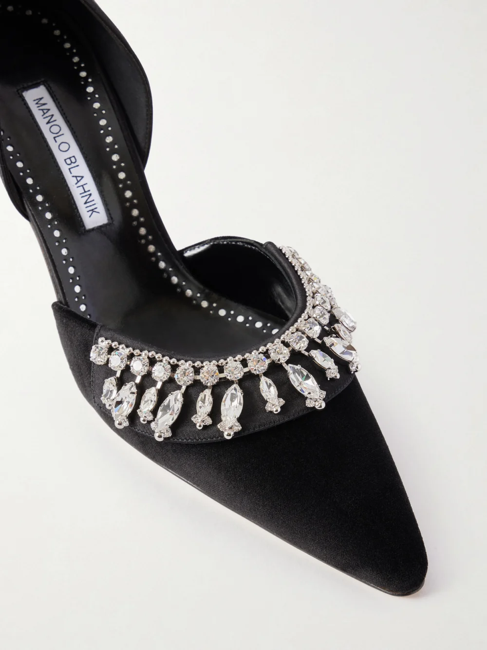 Close-up detail of the Manolo Blahnik Tulidor 70 Crystal-embellished Velvet Pumps