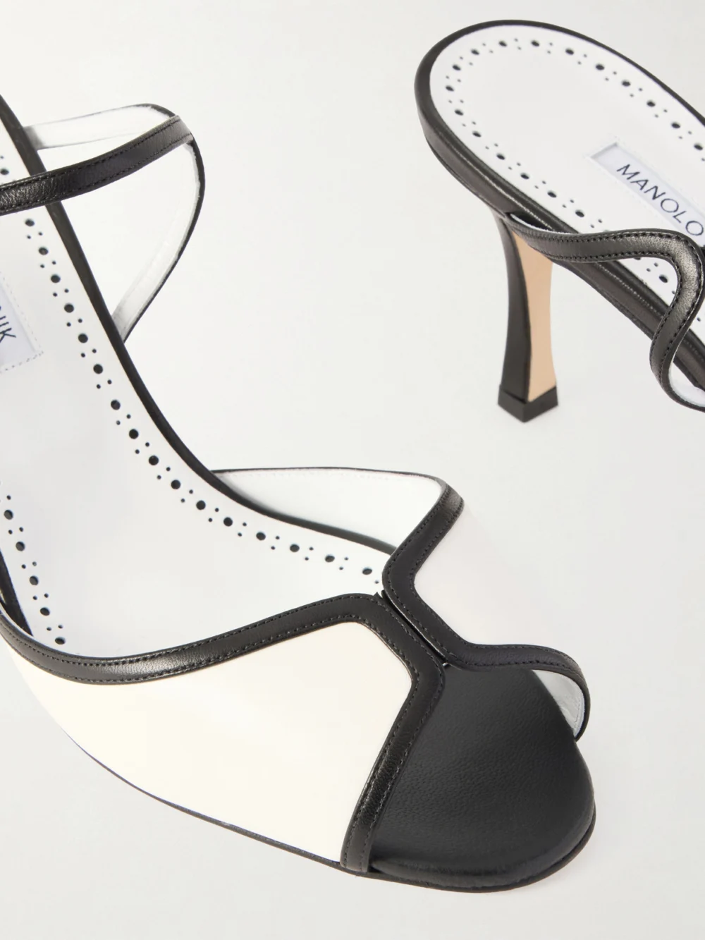 Close-up detail of the Manolo Blahnik Versari 70 Two-tone Leather Mules