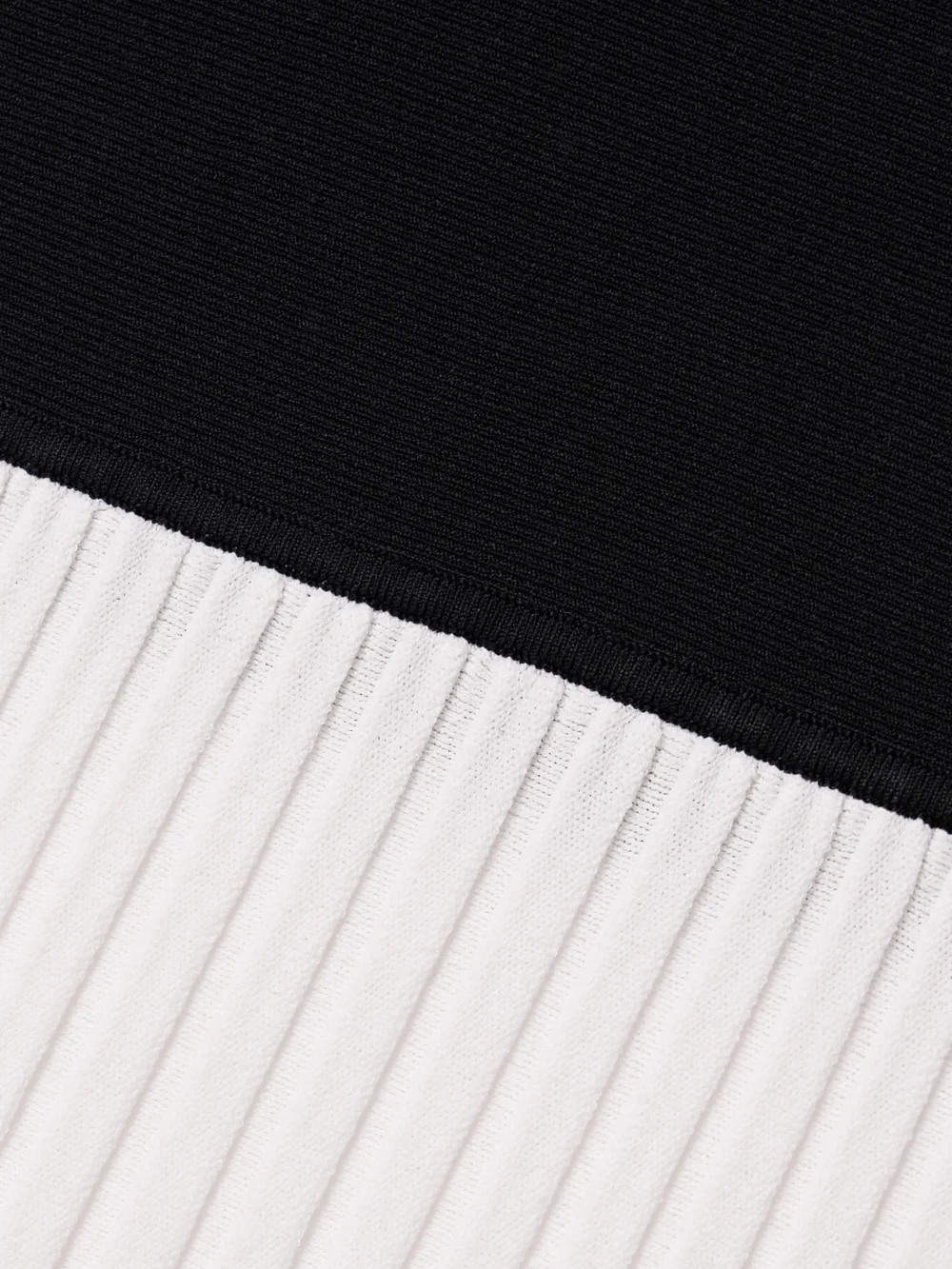 Close-up detail of the Maria McManus Ballet Two-tone Pleated Stretch-knit Midi Dress