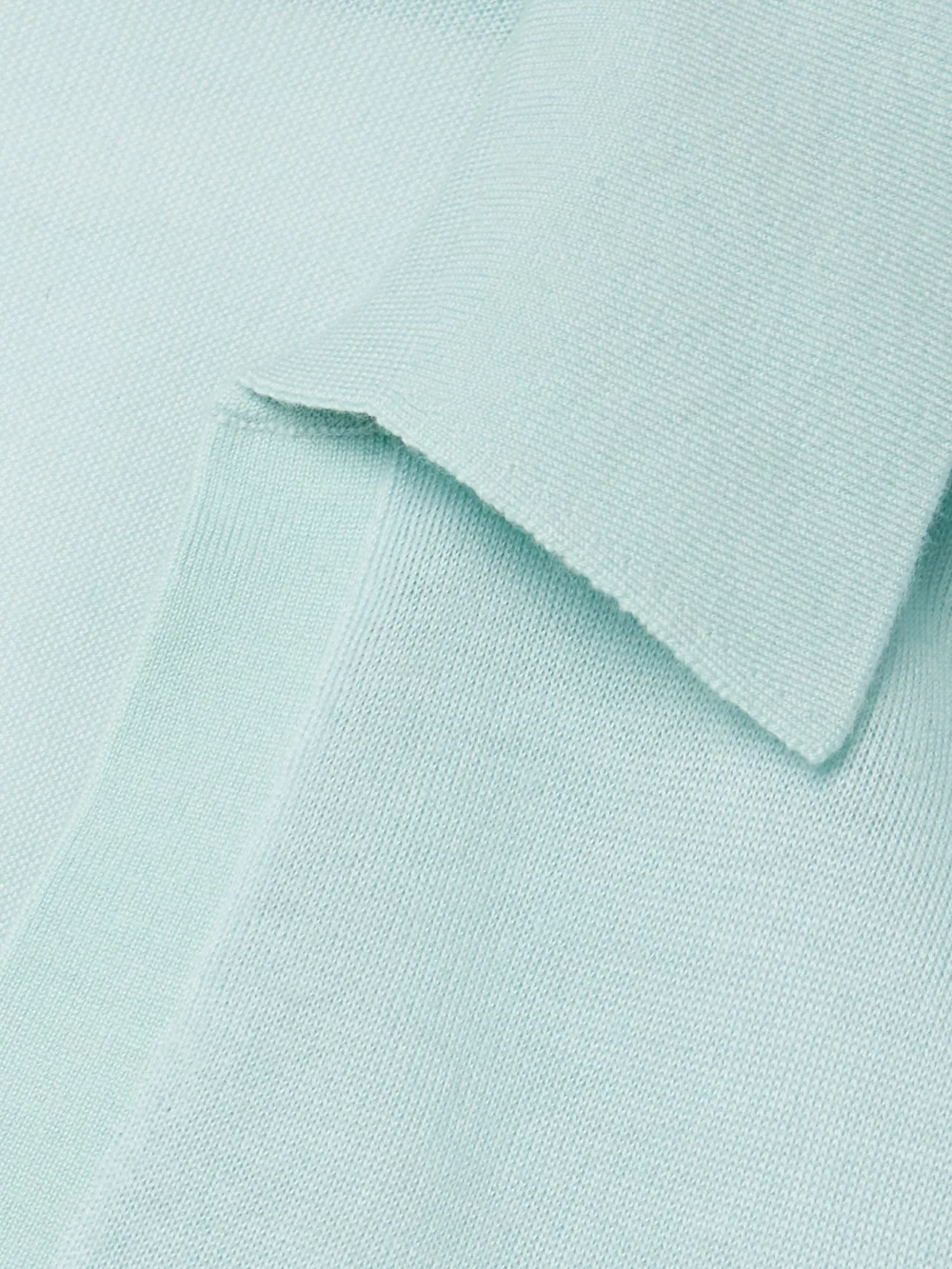 Close-up detail of the Maria McManus Cashmere Polo Top