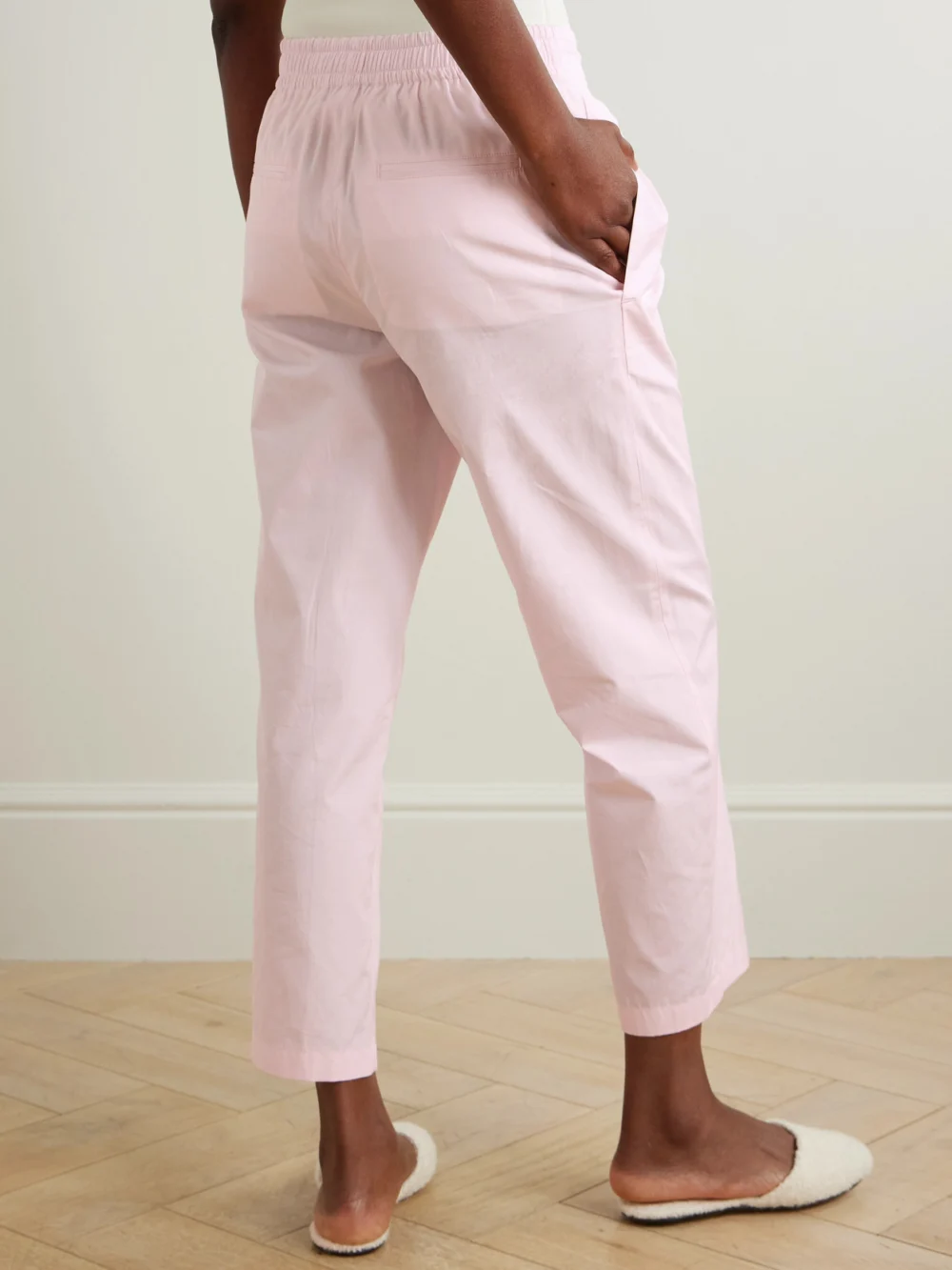 Back view of the Maria McManus Pleated Organic Cotton-poplin Tapered Pants