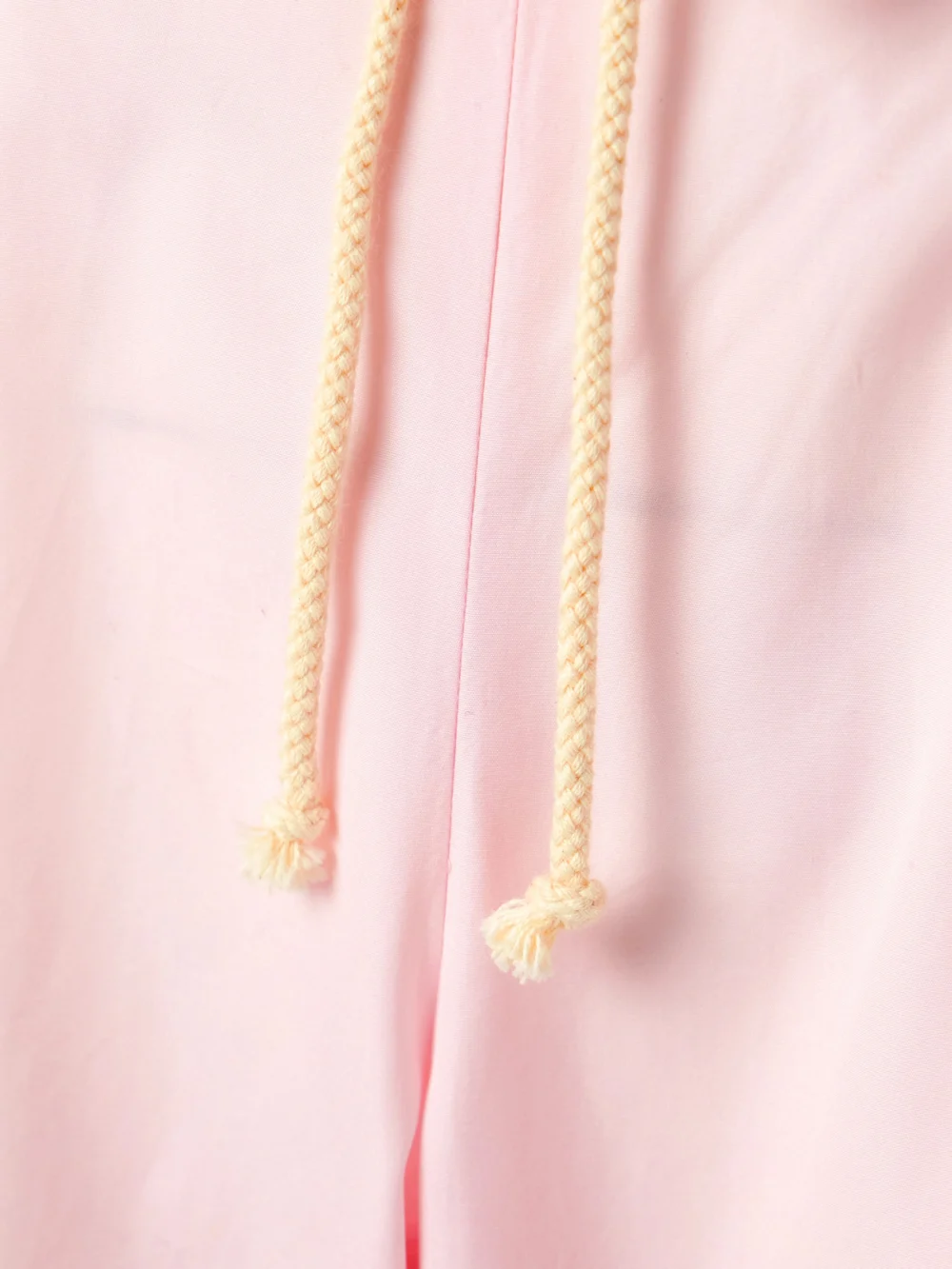 Close-up detail of the Maria McManus Pleated Organic Cotton-poplin Tapered Pants